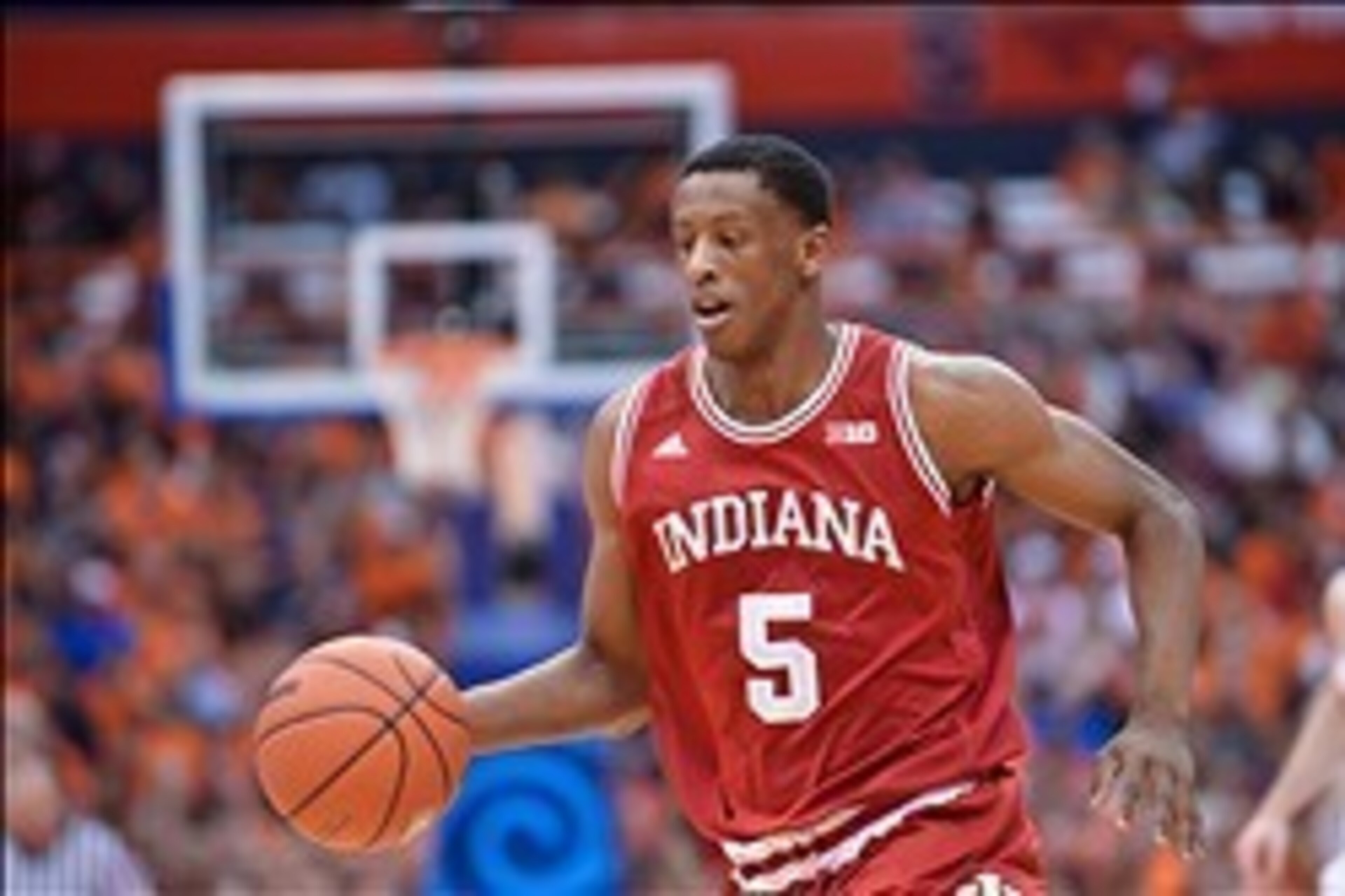 Dec 3, 2013; Syracuse, NY, USA; Indiana Hoosiers forward Troy Williams (5) on a fast break during the first half of a game against the Syracuse Orange at the Carrier Dome. Syracuse won the game 69-52. Mandatory Credit: Mark Konezny-USA TODAY Sports