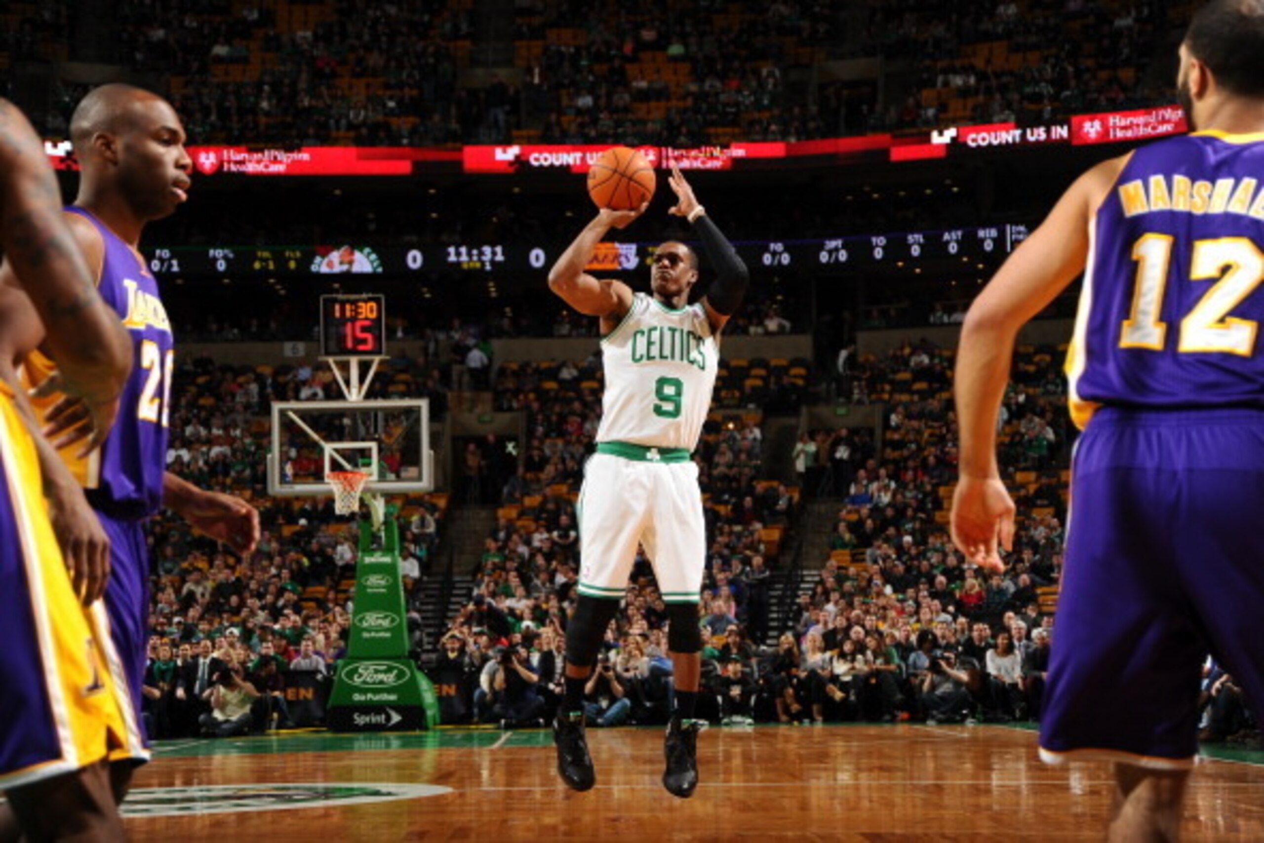 BOSTON, MA - JANUARY 17: Rajon Rondo #9 of the Boston Celtics shoots the ball against the Los Angeles Lakers on January 17, 2014 at the TD Garden in Boston, Massachusetts.  NOTE TO USER: User expressly acknowledges and agrees that, by downloading and or u