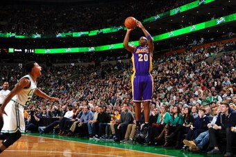 BOSTON, MA - JANUARY 17: Jodie Meeks #20 of the Los Angeles Lakers shoots the ball against the Boston Celtics on January 17, 2014 at the TD Garden in Boston, Massachusetts.  NOTE TO USER: User expressly acknowledges and agrees that, by downloading and or 