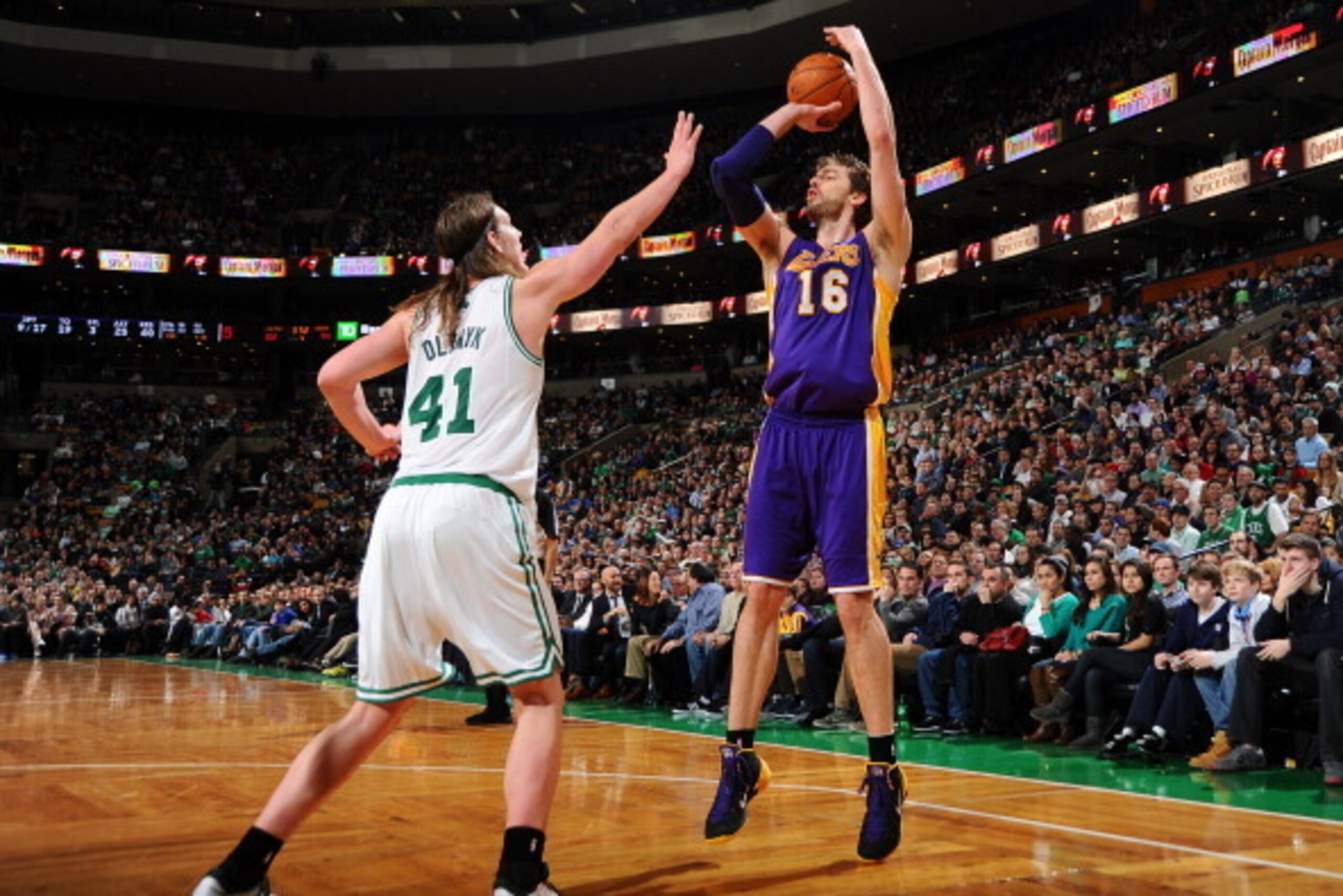 BOSTON, MA - JANUARY 17: Pau Gasol #16 of the Los Angeles Lakers shoots the ball against Kelly Olynyk #41 of the Boston Celtics on January 17, 2014 at the TD Garden in Boston, Massachusetts.  NOTE TO USER: User expressly acknowledges and agrees that, by d