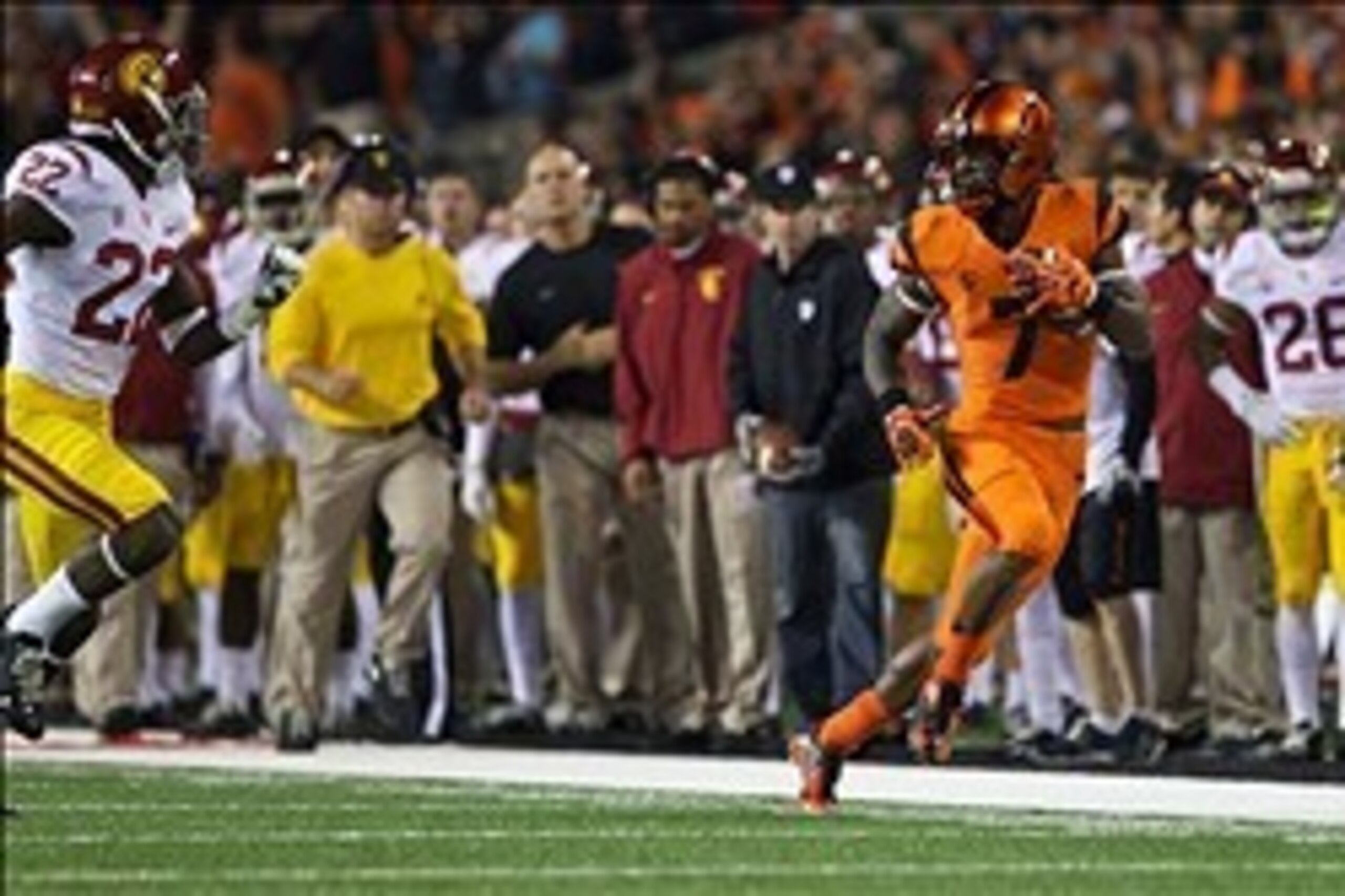 Nov 1, 2013; Corvallis, OR, USA; Oregon State Beavers wide receiver Brandin Cooks (7) races down the sideline against USC Trojans safety Leon McQuay III (22) in the second half at Reser Stadium. Mandatory Credit: Jaime Valdez-USA TODAY Sports Nov 1, 2013; Corvallis, OR, USA; Oregon State Beavers wide receiver Brandin Cooks (7) races down the sideline against USC Trojans safety Leon McQuay III (22) in the second half at Reser Stadium. Mandatory Credit: Jaime Valdez-USA TODAY Sports