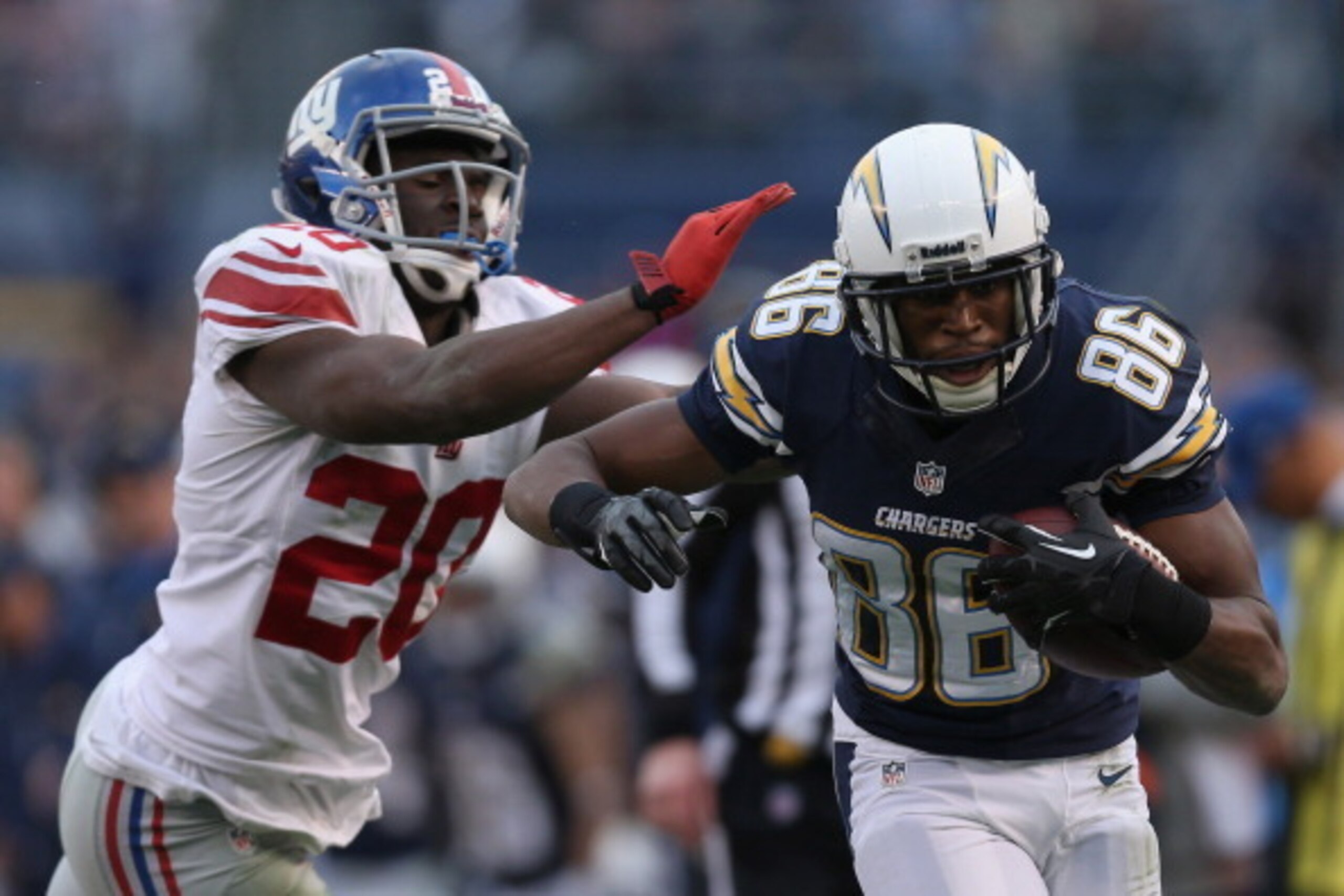 SAN DIEGO, CA - DECEMBER 08:  Wide receiver Vincent Brown #86 of the San Diego Chargers is pursued by cornerback Prince Amukamara #20 of the New York Giants at Qualcomm Stadium on December 8, 2013 in San Diego, California.  (Photo by Jeff Gross/Getty Imag