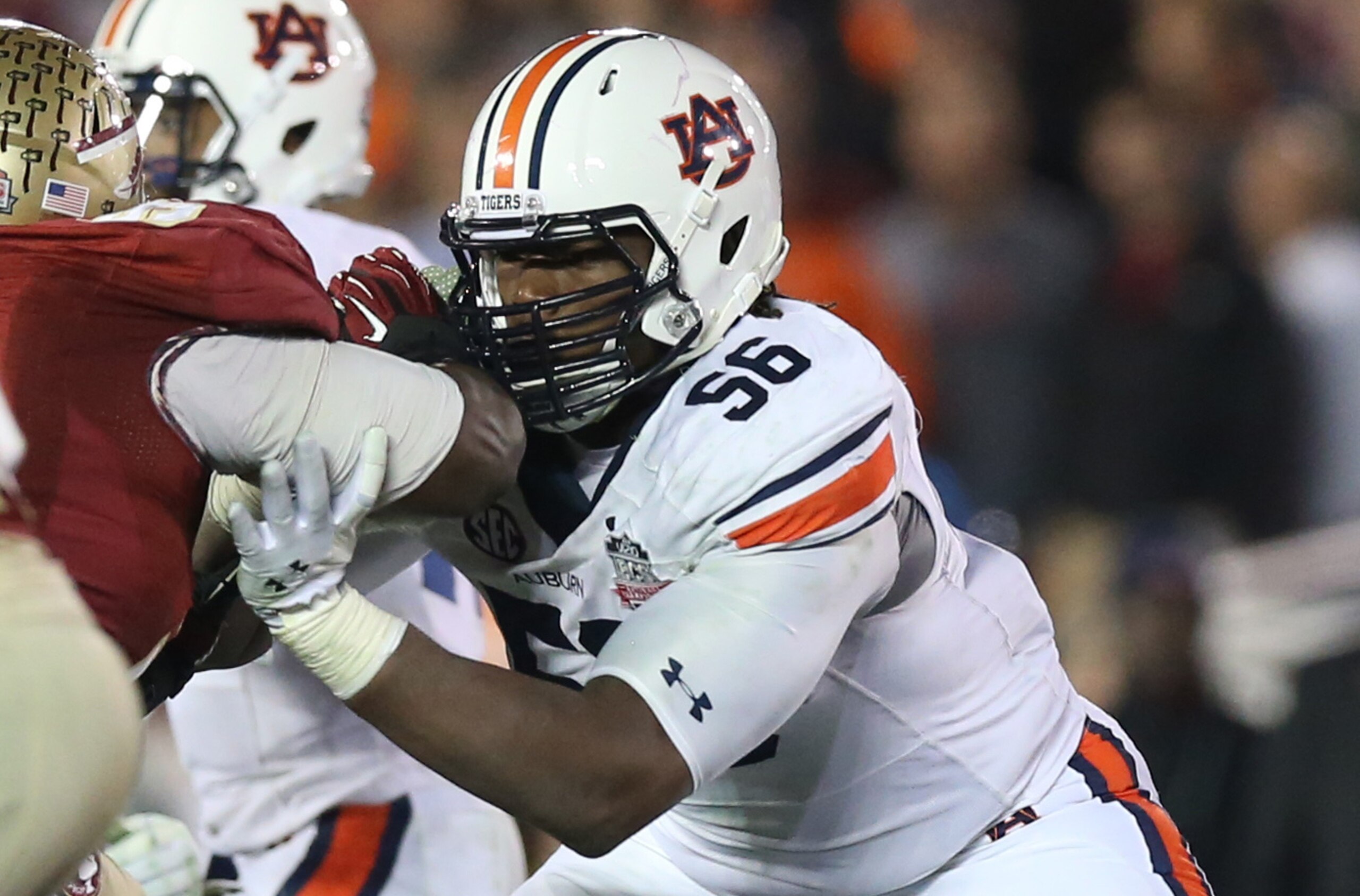 Jan 6, 2014; Pasadena, CA, USA; Auburn Tigers tackle Avery Young (56) in action against the Florida State Seminoles during the first half of the 2014 BCS National Championship game at the Rose Bowl. Mandatory Credit: Matthew Emmons-USA TODAY Sports