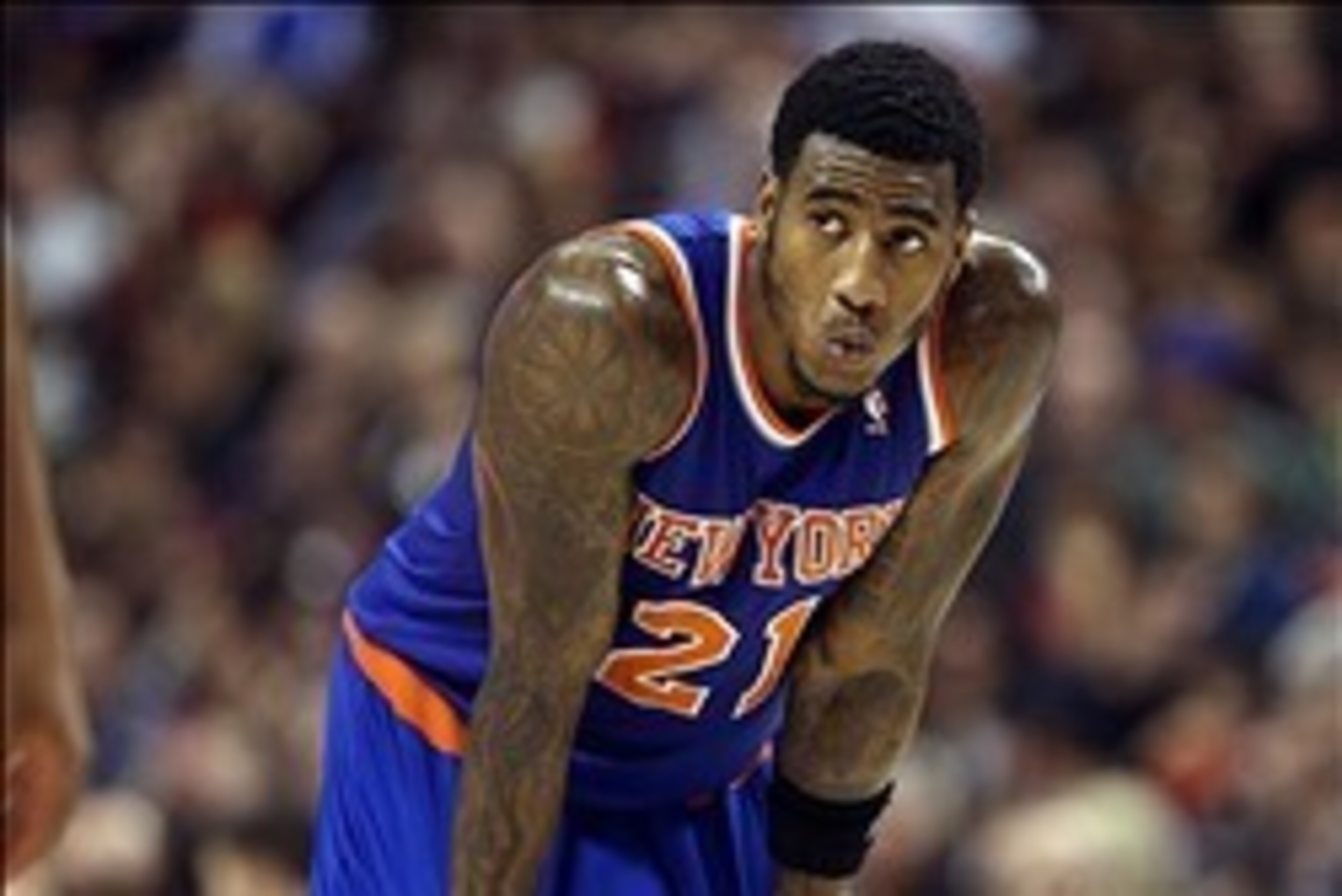 Dec 28, 2013; Toronto, Ontario, CAN; New York Knicks guard Iman Shumpert (21) looks on against the Toronto Raptors at Air Canada Centre. The Raptors beat the Knicks 115-100. Mandatory Credit: Tom Szczerbowski-USA TODAY Sports