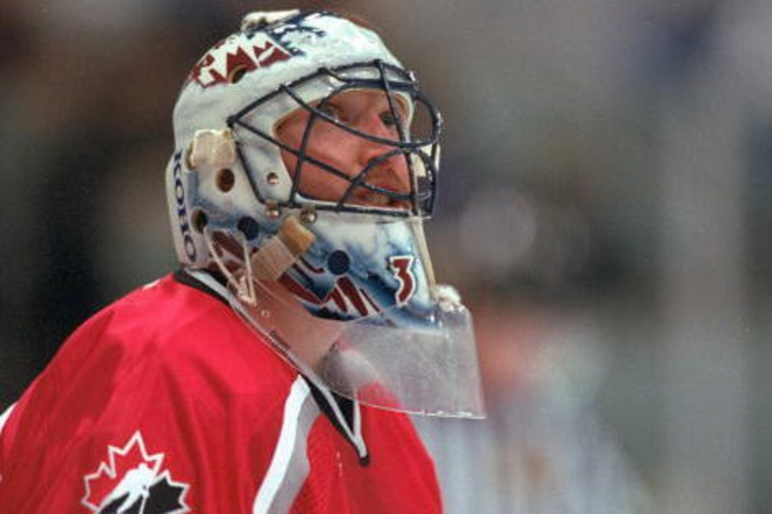 20 Feb 1998:  Patrick Roy of Canada looks on during a time out against the Czech Republic at the Big Hat Arena during the 1998 Olympic Winter Games in Nagano, Japan. The Czech Republic won 2-1 in overtime to advance to the gold medal game. \ Mandatory Cre