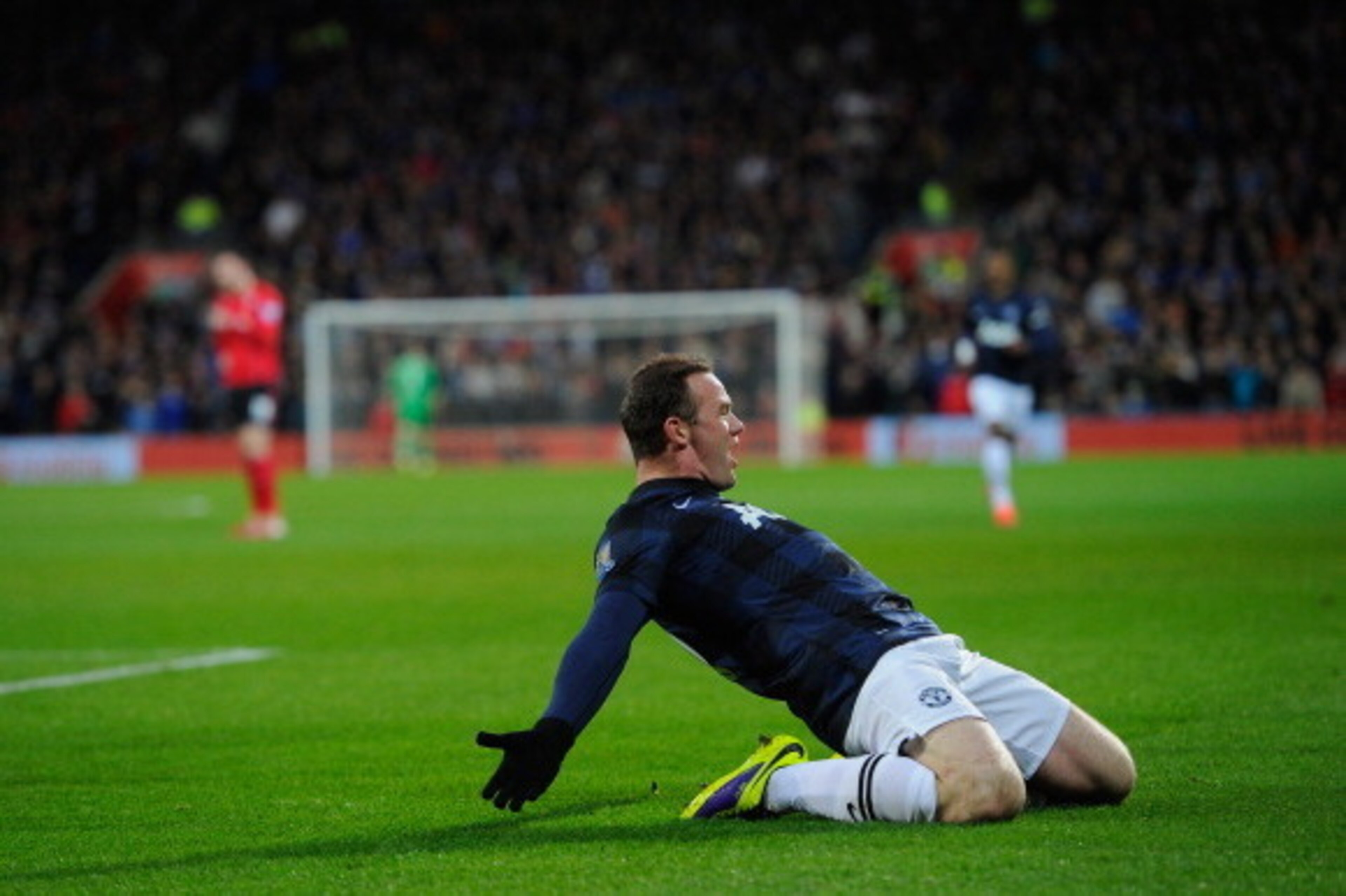 CARDIFF, WALES - NOVEMBER 24: Manchester United player Wayne Rooney celebrates the first goal during the Barclays Premier League match between Cardiff City and Manchester United at Cardiff City Stadium on November 24, 2013 in Cardiff, Wales. (Photo by CARDIFF, WALES - NOVEMBER 24: Manchester United player Wayne Rooney celebrates the first goal during the Barclays Premier League match between Cardiff City and Manchester United at Cardiff City Stadium on November 24, 2013 in Cardiff, Wales. (Photo by