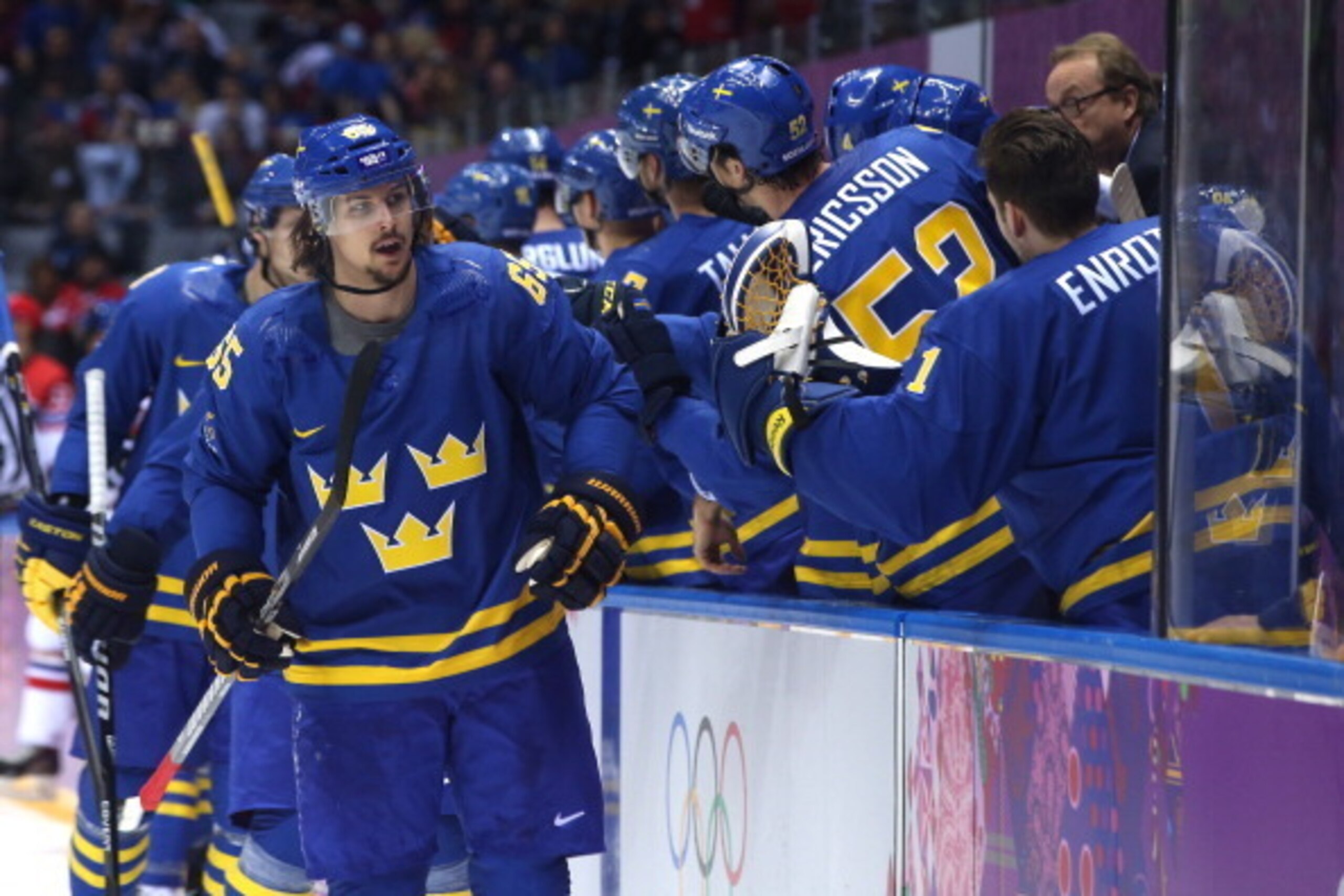 SOCHI, RUSSIA - FEBRUARY 12:  Erik Karlsson #65 of Sweden celebrates with teammates after scoring a goal in the first period against Jakub Kovar #1 of Czech Republic during the Men's Ice Hockey Preliminary Round Group C game on day five of the Sochi 2014 