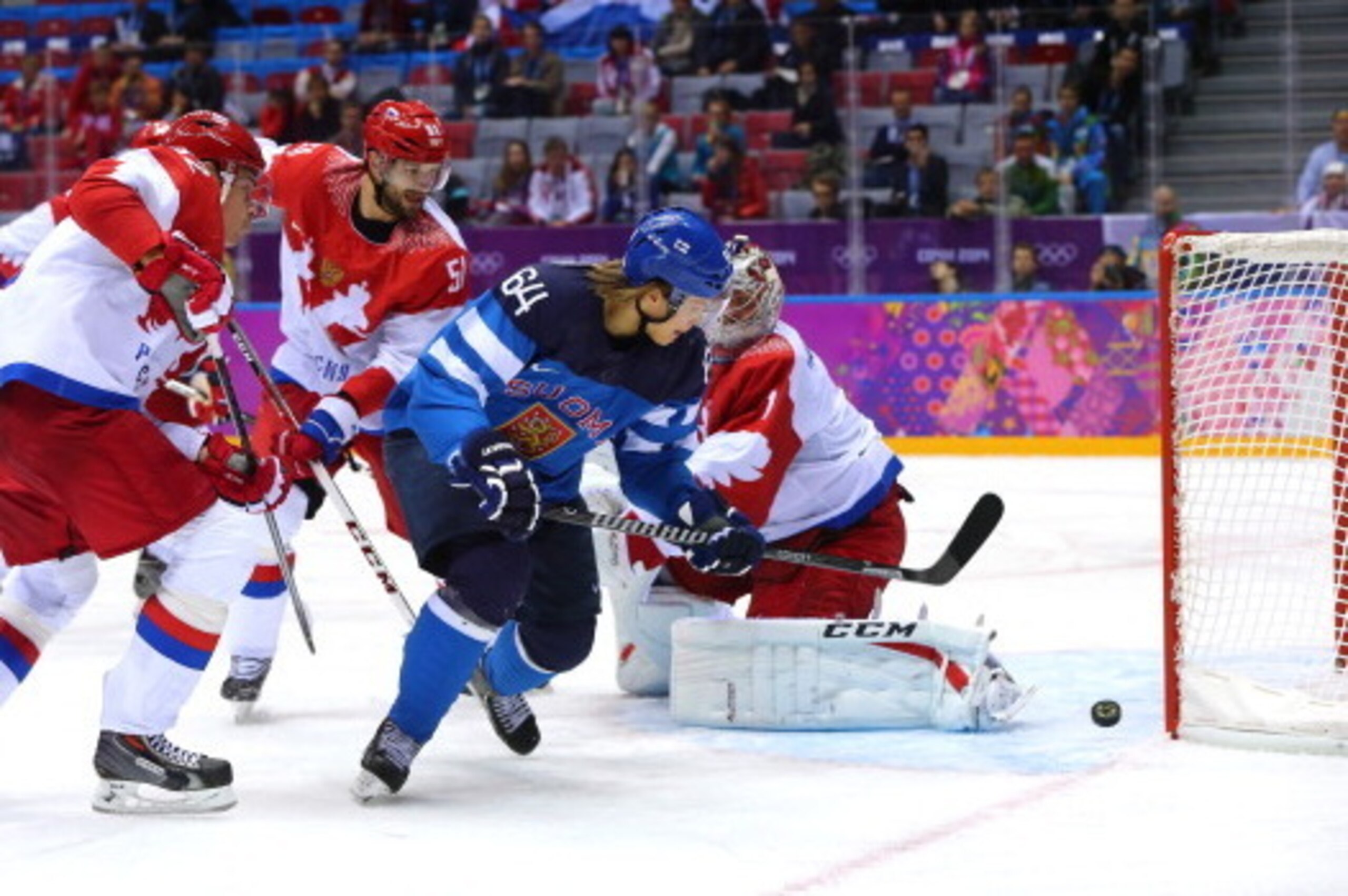 SOCHI, RUSSIA - FEBRUARY 19:  Mikael Granlund #64 of Finland scores a second-period goal against Semyon Varlamov #1 of Russia during the Men's Ice Hockey Quarterfinal Playoff on Day 12 of the 2014 Sochi Winter Olympics at Bolshoy Ice Dome on February 19, 