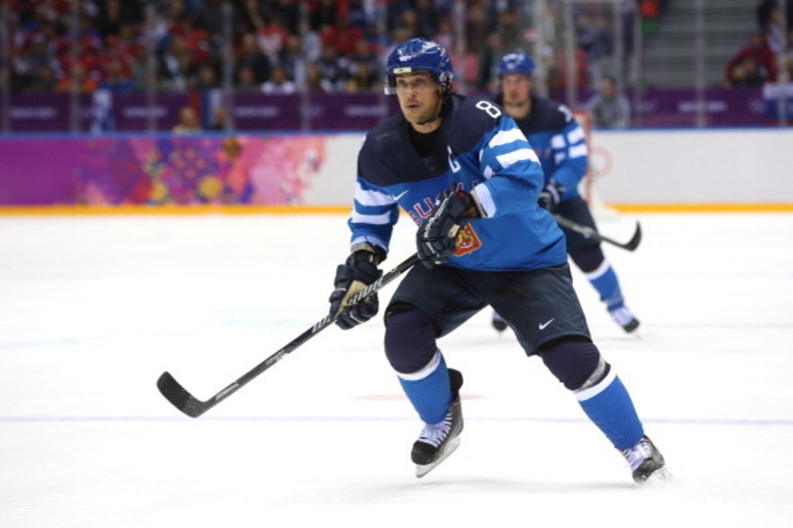 SOCHI, RUSSIA - FEBRUARY 19:  Teemu Selanne #8 of Finland skates during the Men's Ice Hockey Quarterfinal Playoff against Russia on Day 12 of the 2014 Sochi Winter Olympics at Bolshoy Ice Dome on February 19, 2014 in Sochi, Russia.  (Photo by Bruce Bennet