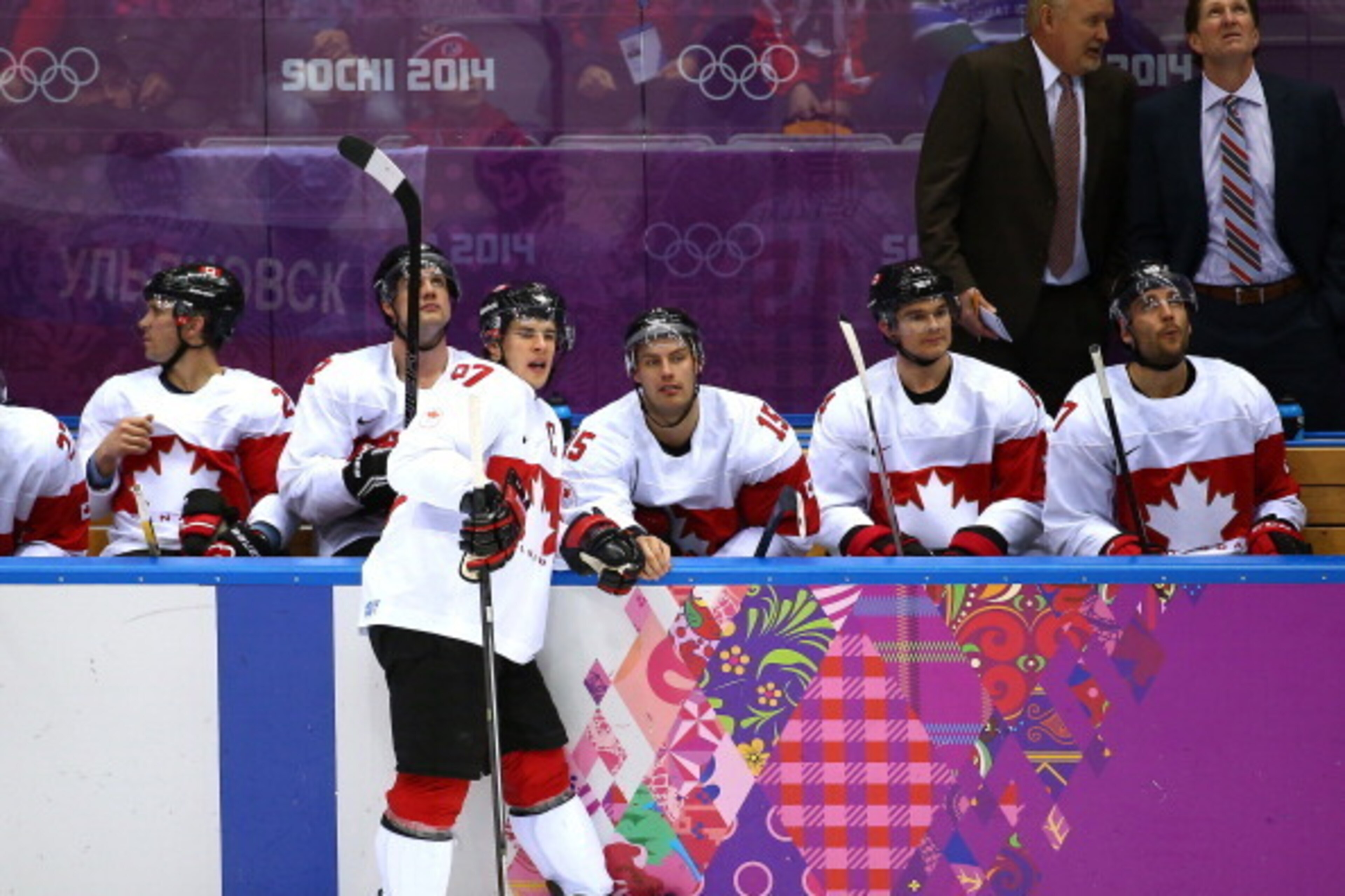 SOCHI, RUSSIA - FEBRUARY 19:  Sidney Crosby #87 of Canada and teammates look up as referees debate a goal during the Men's Ice Hockey Quarterfinal Playoff on Day 12 of the 2014 Sochi Winter Olympics at Bolshoy Ice Dome on February 19, 2014 in Sochi, Russi