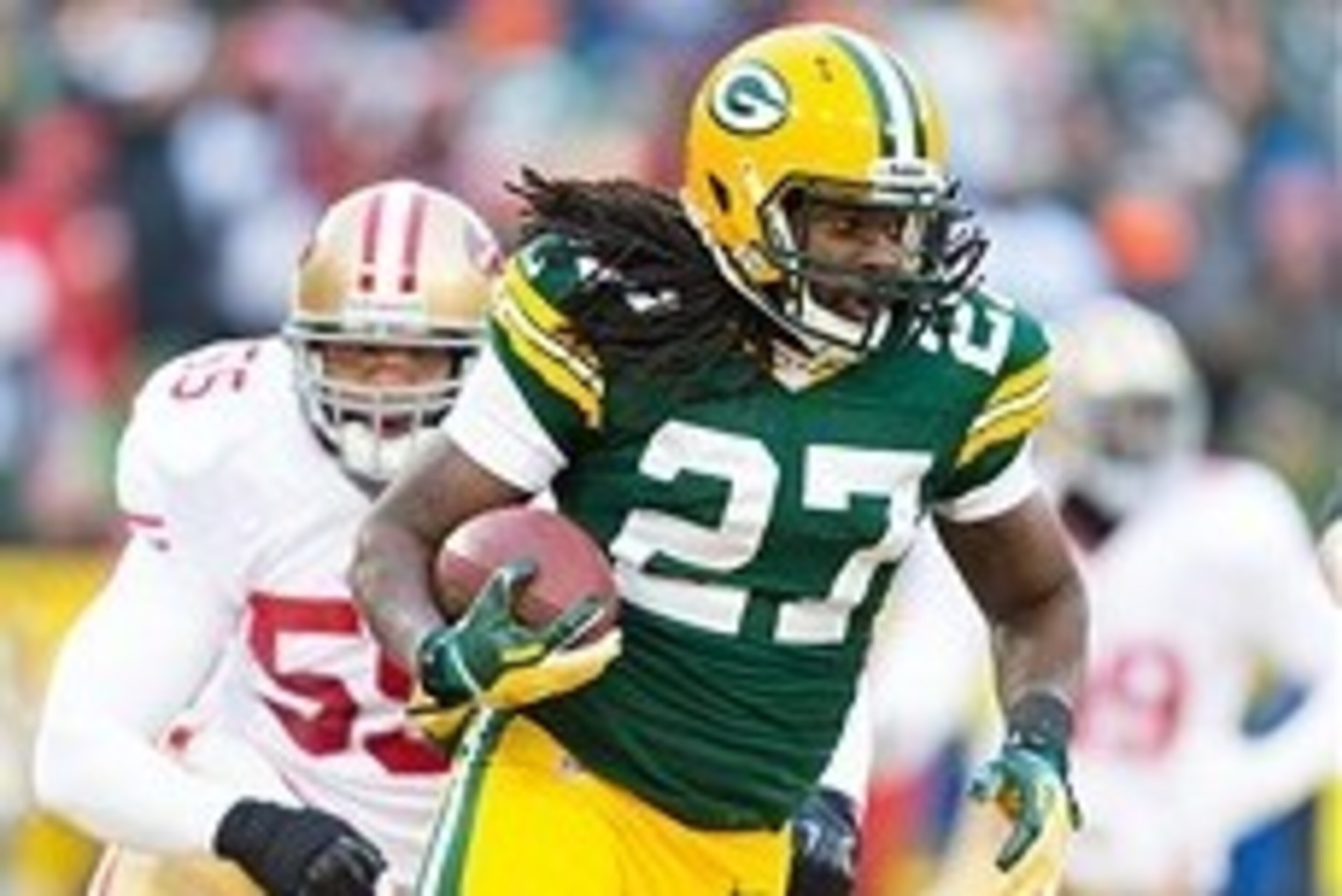 Jan 5, 2014; Green Bay, WI, USA; Green Bay Packers running back Eddie Lacy (27) during the 2013 NFC wild card playoff football game against the San Francisco 49ers at Lambeau Field.  San Francisco won 23-20.  Mandatory Credit: Jeff Hanisch-USA TODAY Sport