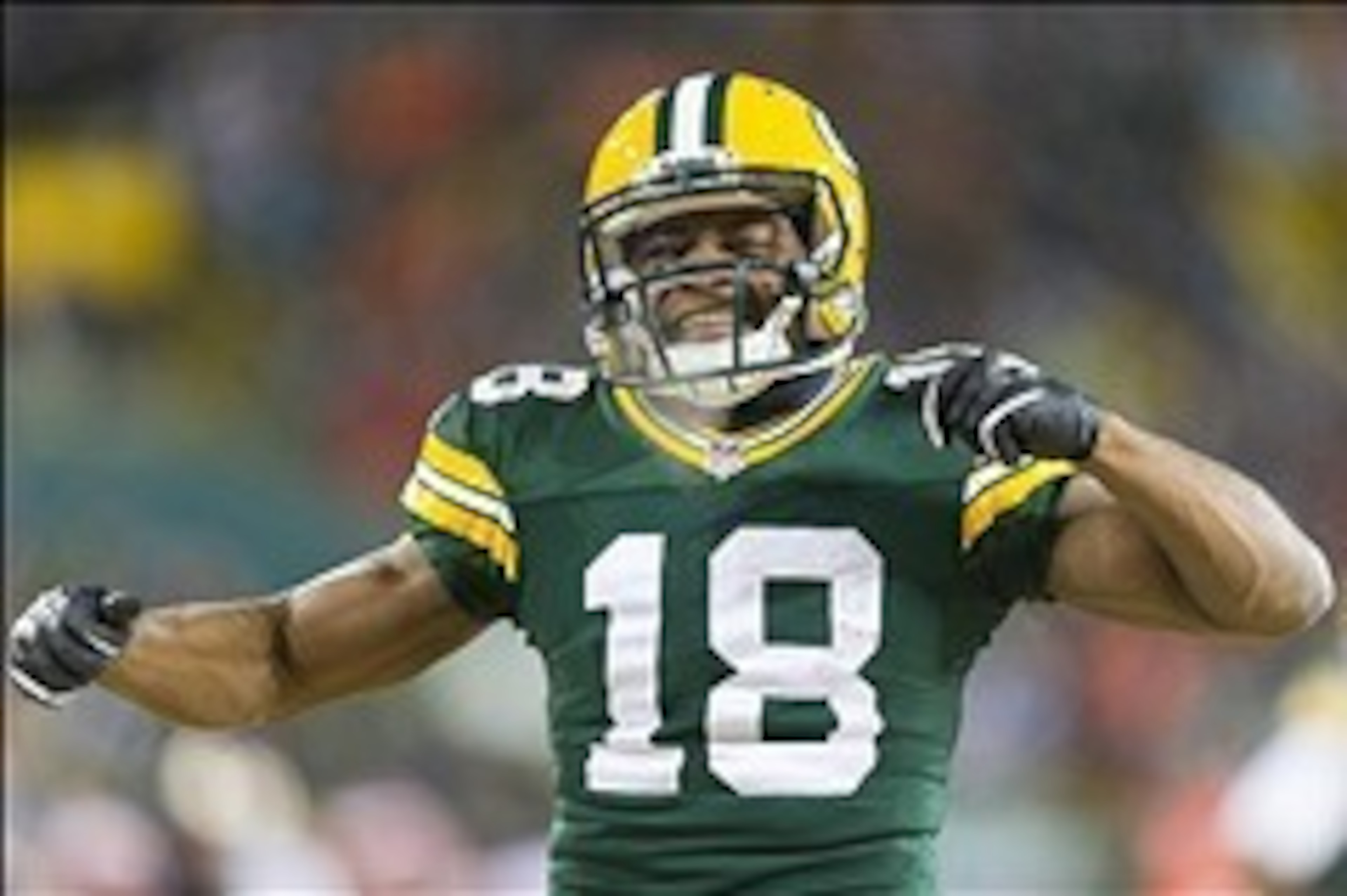 Jan 5, 2014; Green Bay, WI, USA; Green Bay Packers wide receiver Randall Cobb (18) celebrates a catch during the fourth quarter against the San Francisco 49ers during the 2013 NFC wild card playoff football game at Lambeau Field. Mandatory Credit: Jeff Ha