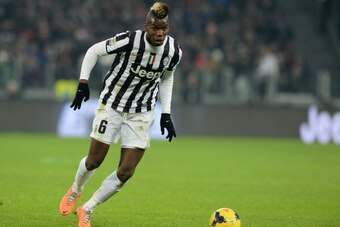 TURIN, ITALY - FEBRUARY 02:  Paul Pogba of Juventus in action during the Serie A match between Juventus and FC Internazionale Milano at Juventus Arena on February 2, 2014 in Turin, Italy.  (Photo by Claudio Villa/Getty Images)
