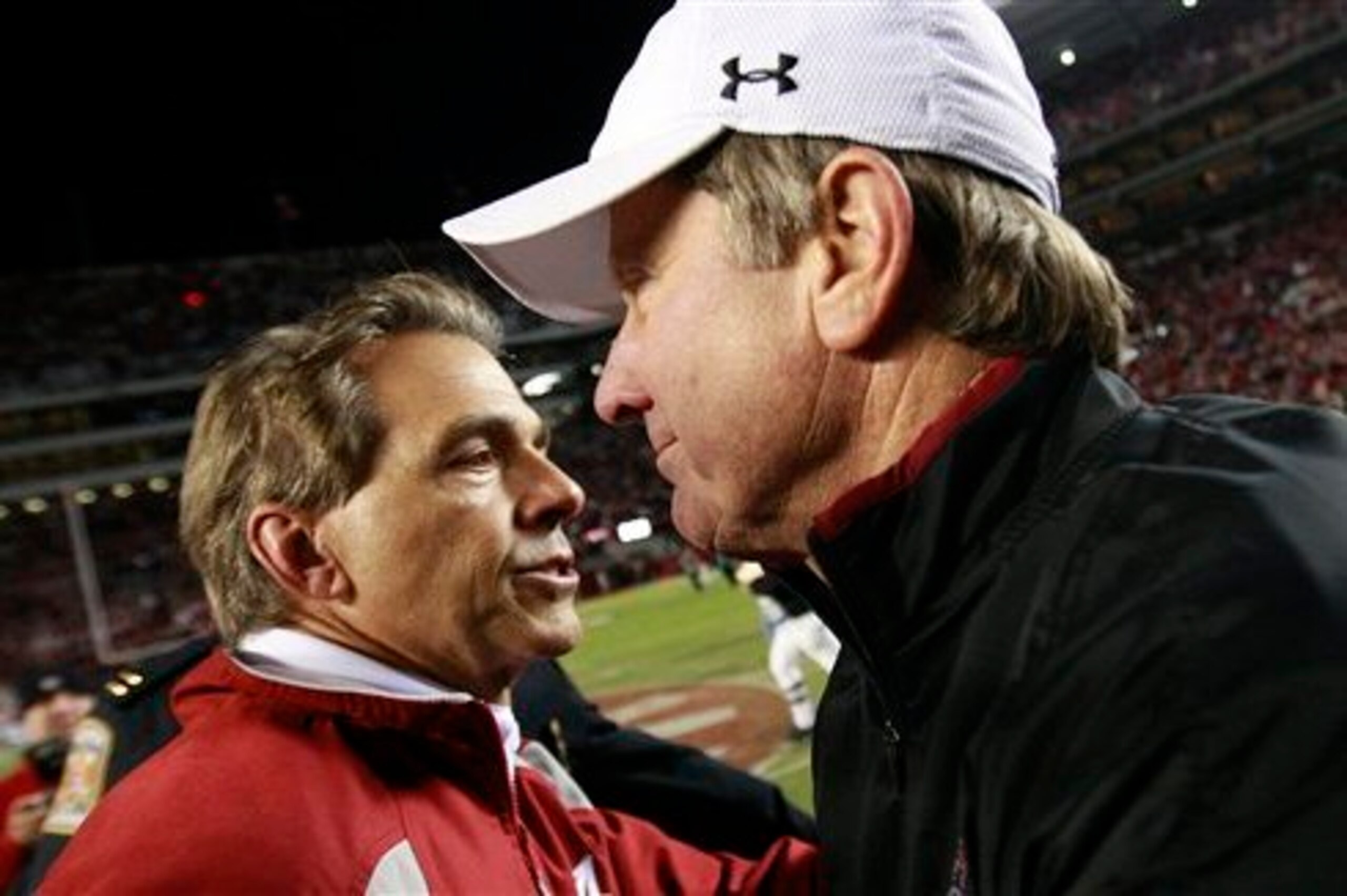 Alabama head coach Nick Saban (left) and South Carolina head coach Steve Spurrier (right)