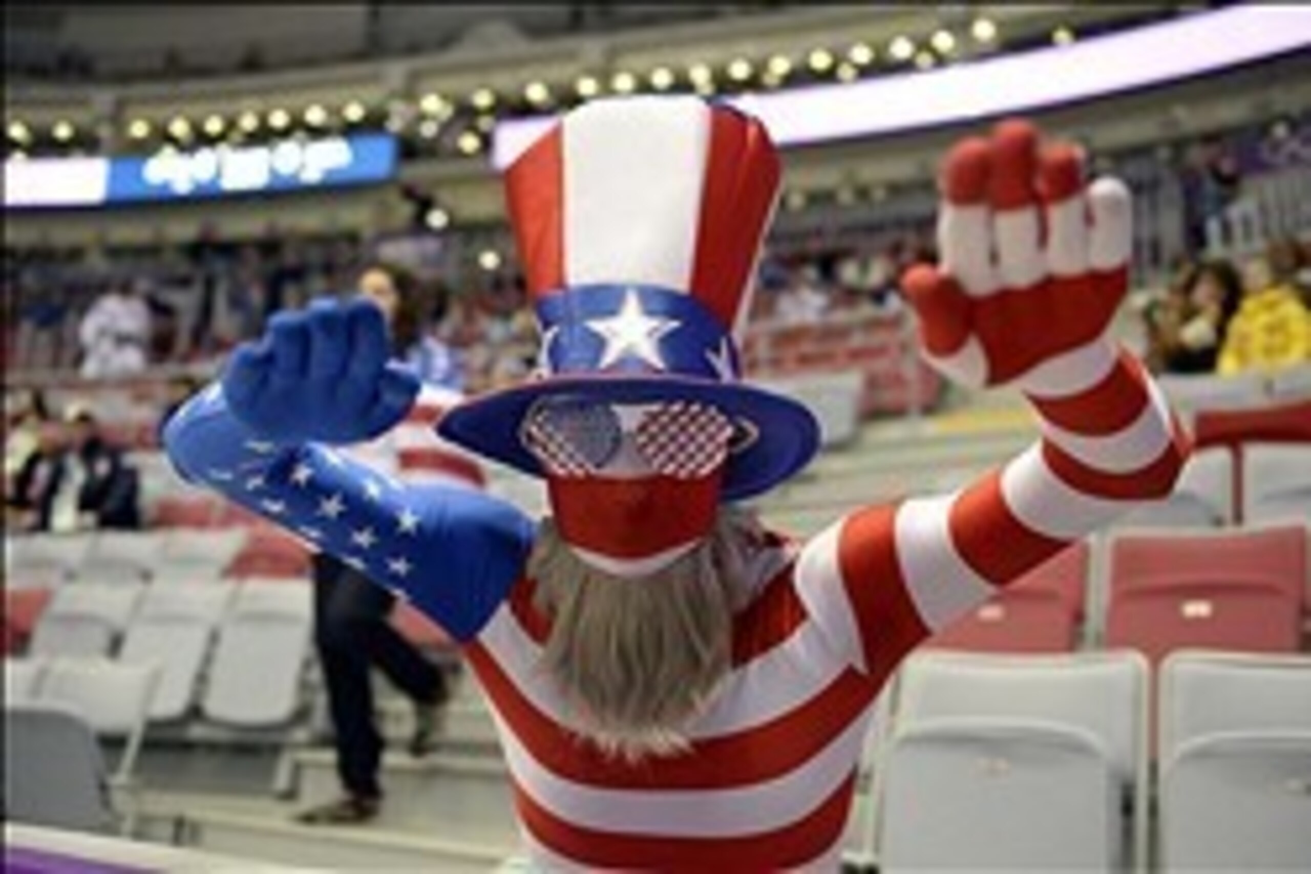 Feb 20, 2014; Sochi, RUSSIA; A fan identified only as The Flag poses for a photo before the women's ice hockey gold medal game between USA and Canada during the Sochi 2014 Olympic Winter Games at Bolshoy Ice Dome. Mandatory Credit: Richard Mackson-USA TOD