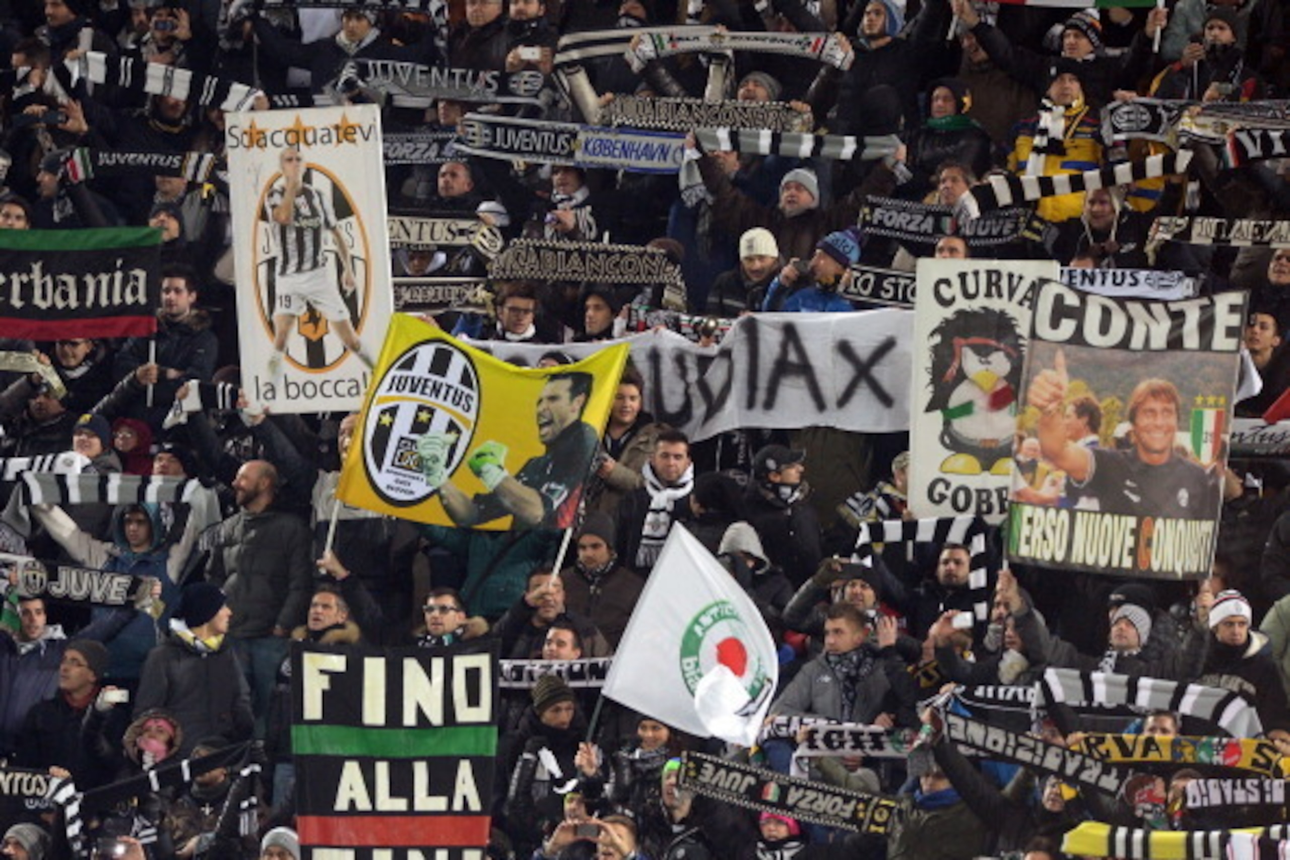 TURIN, ITALY - NOVEMBER 27:  Juventus supporters during the UEFA Champions League Group B match between Juventus and FC Copenhagen at Juventus Arena on November 27, 2013 in Turin, Italy.  (Photo by Claudio Villa/Getty Images)
