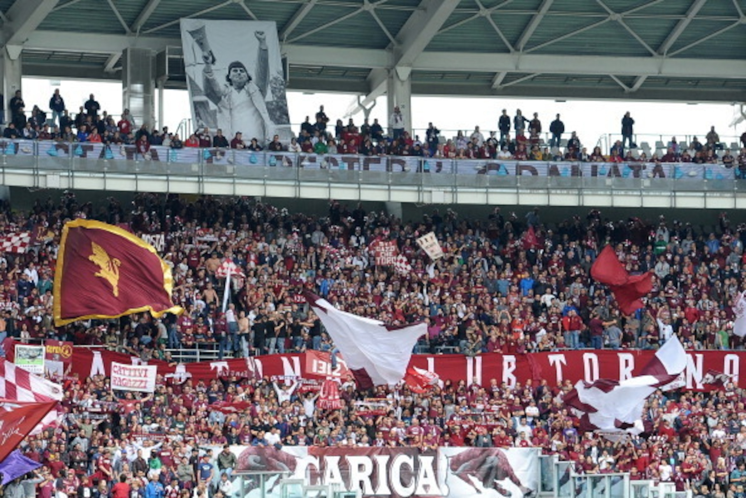 TURIN , ITALY - SEPTEMBER 29:  The Torino fans show their support during the Serie A match between Torino FC and Juventus at Stadio Olimpico di Torino on September 29, 2013, in Turin, Italy.  (Photo by Valerio Pennicino/Getty Images)