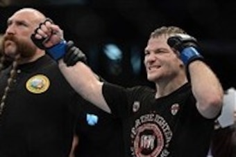 December 14, 2013; Sacramento, CA, USA; Zach Makovsky (blue gloves) defeats Scott Jorgensen (red gloves) during the flyweight bout of the UFC on FOX 9 at Sleep Train Arena. Mandatory Credit: Kyle Terada-USA TODAY Sports