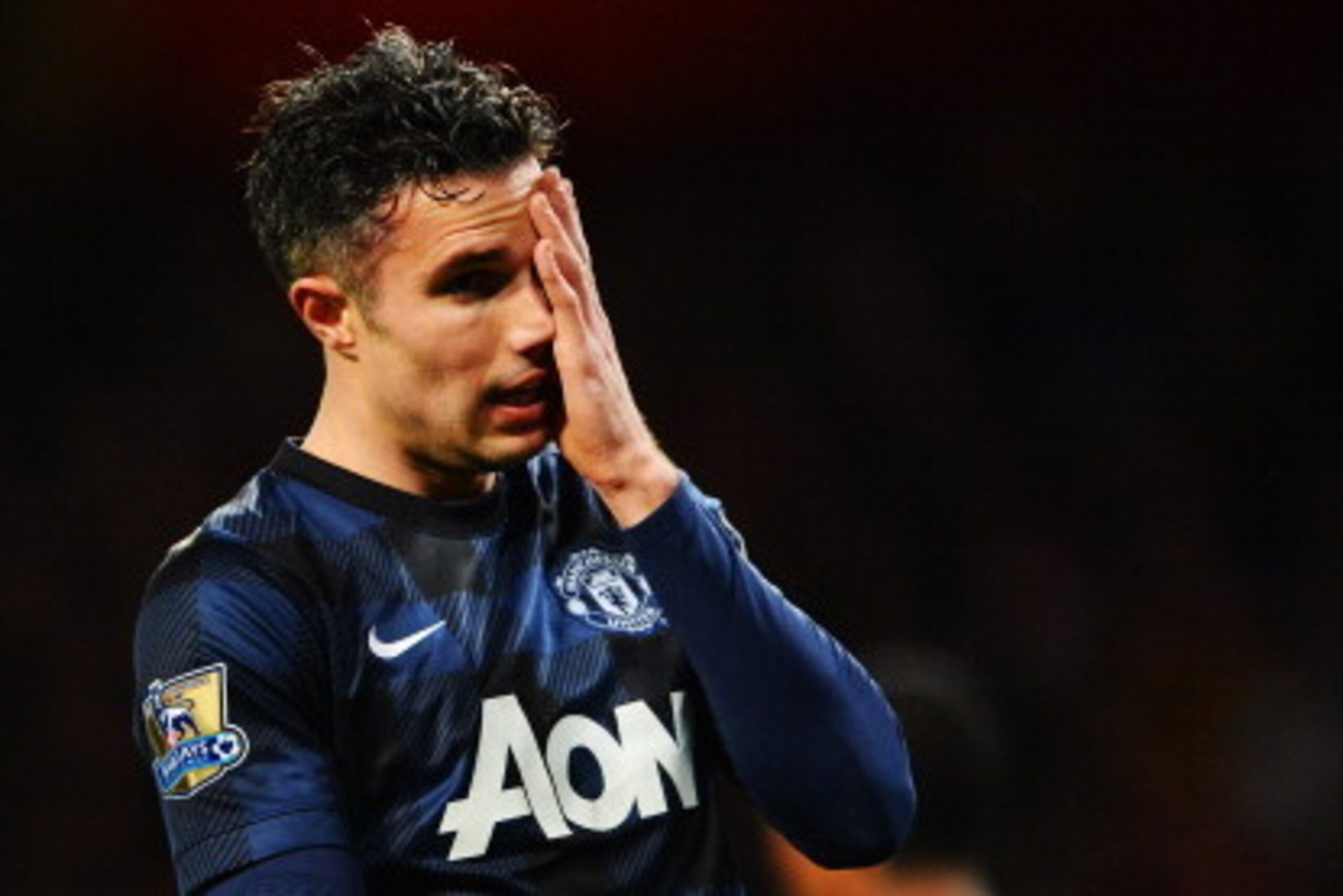 LONDON, ENGLAND - FEBRUARY 12: Robin van Persie of Manchester United reacts during the Barclays Premier League match between Arsenal and Manchester United at the Emirates Stadium on February 12, 2014 in London, England. (Photo by Michael Regan/Getty Ima LONDON, ENGLAND - FEBRUARY 12: Robin van Persie of Manchester United reacts during the Barclays Premier League match between Arsenal and Manchester United at the Emirates Stadium on February 12, 2014 in London, England. (Photo by Michael Regan/Getty Ima