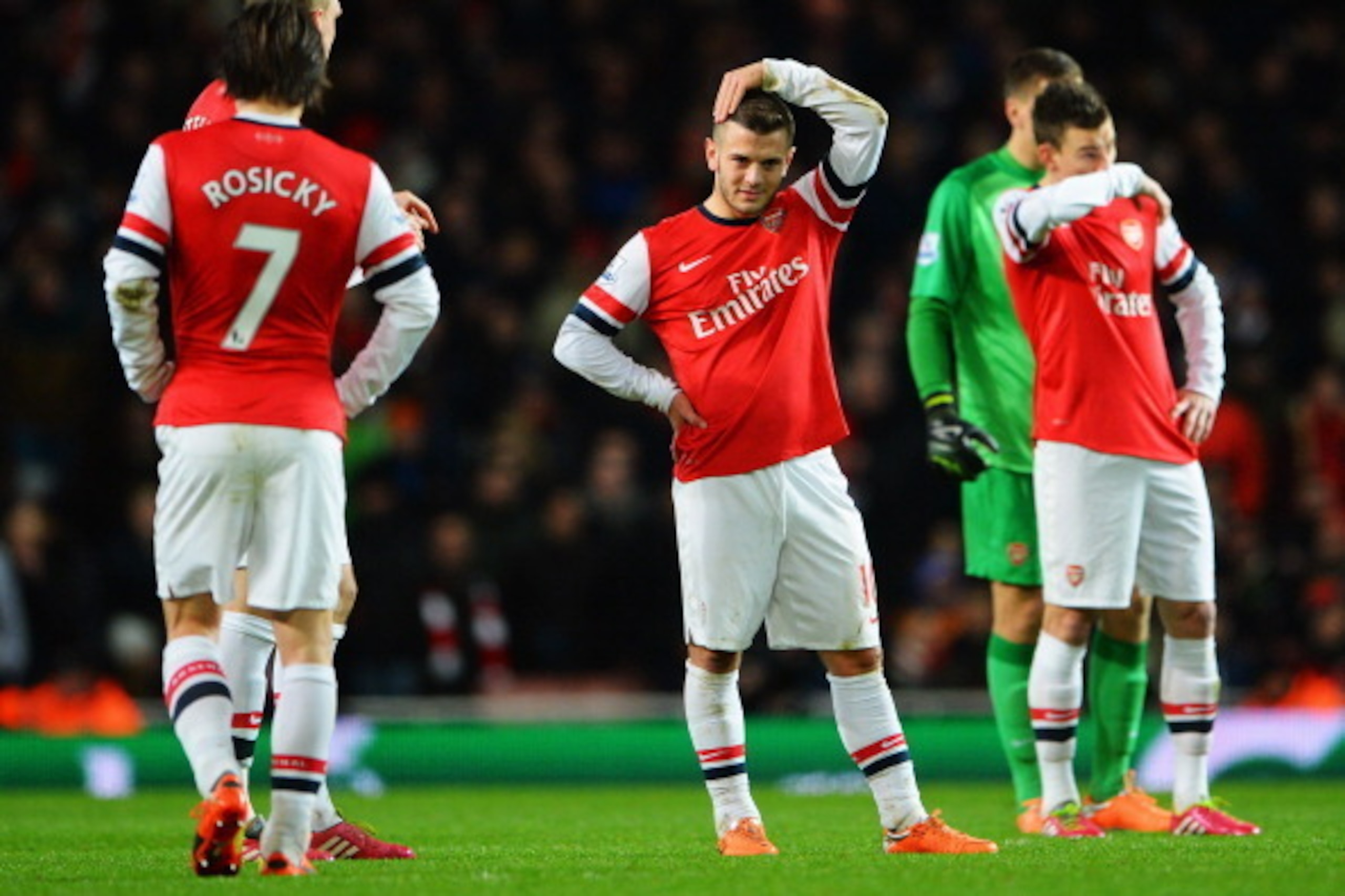 LONDON, ENGLAND - FEBRUARY 12: Jack Wilshere (C) of Arsenal reacts during the Barclays Premier League match between Arsenal and Manchester United at the Emirates Stadium on February 12, 2014 in London, England. (Photo by Michael Regan/Getty Images) LONDON, ENGLAND - FEBRUARY 12: Jack Wilshere (C) of Arsenal reacts during the Barclays Premier League match between Arsenal and Manchester United at the Emirates Stadium on February 12, 2014 in London, England. (Photo by Michael Regan/Getty Images)
