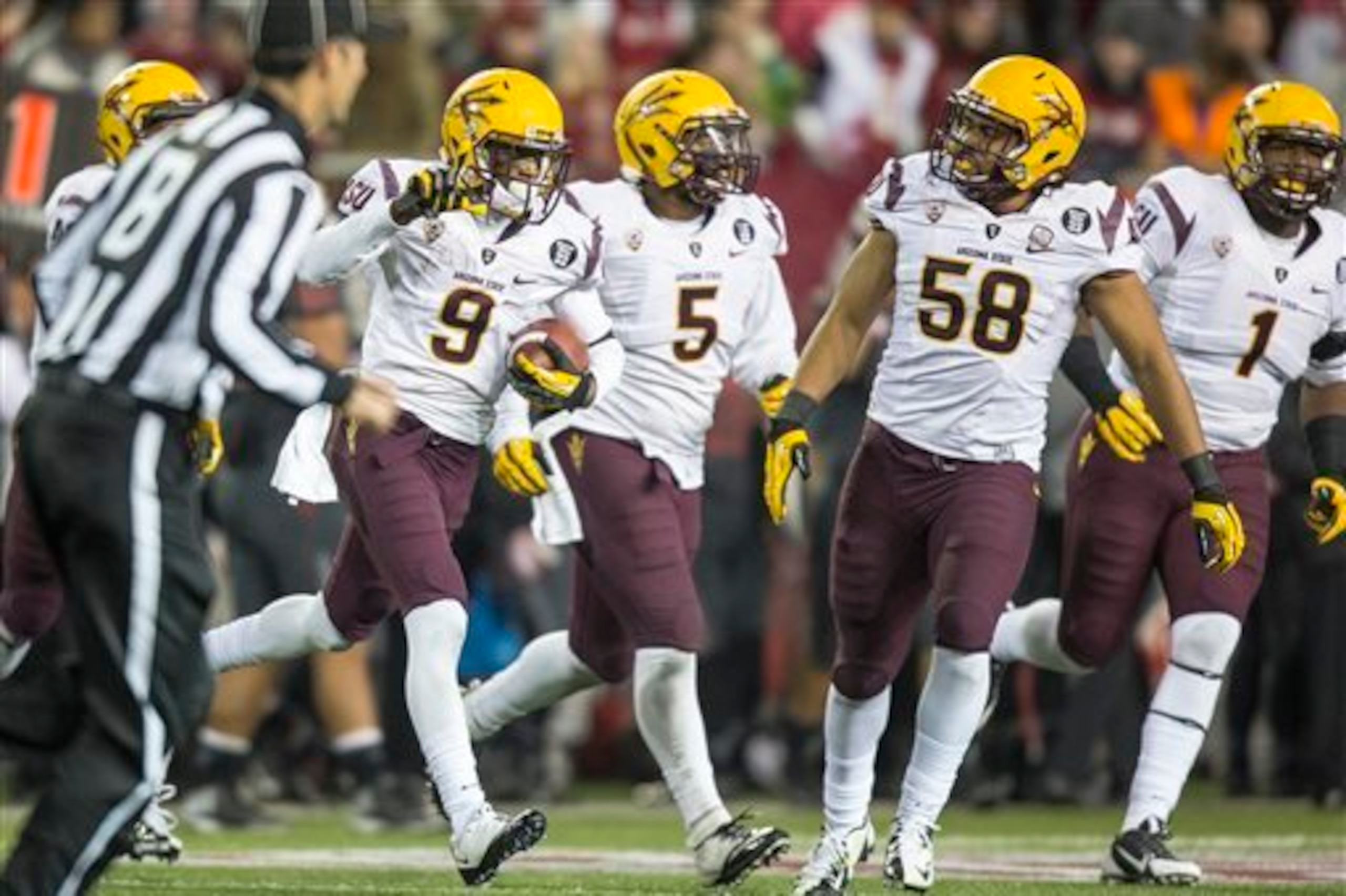 Arizona State's Robert Nelson (No. 9) intercepted six passes in 2013.
