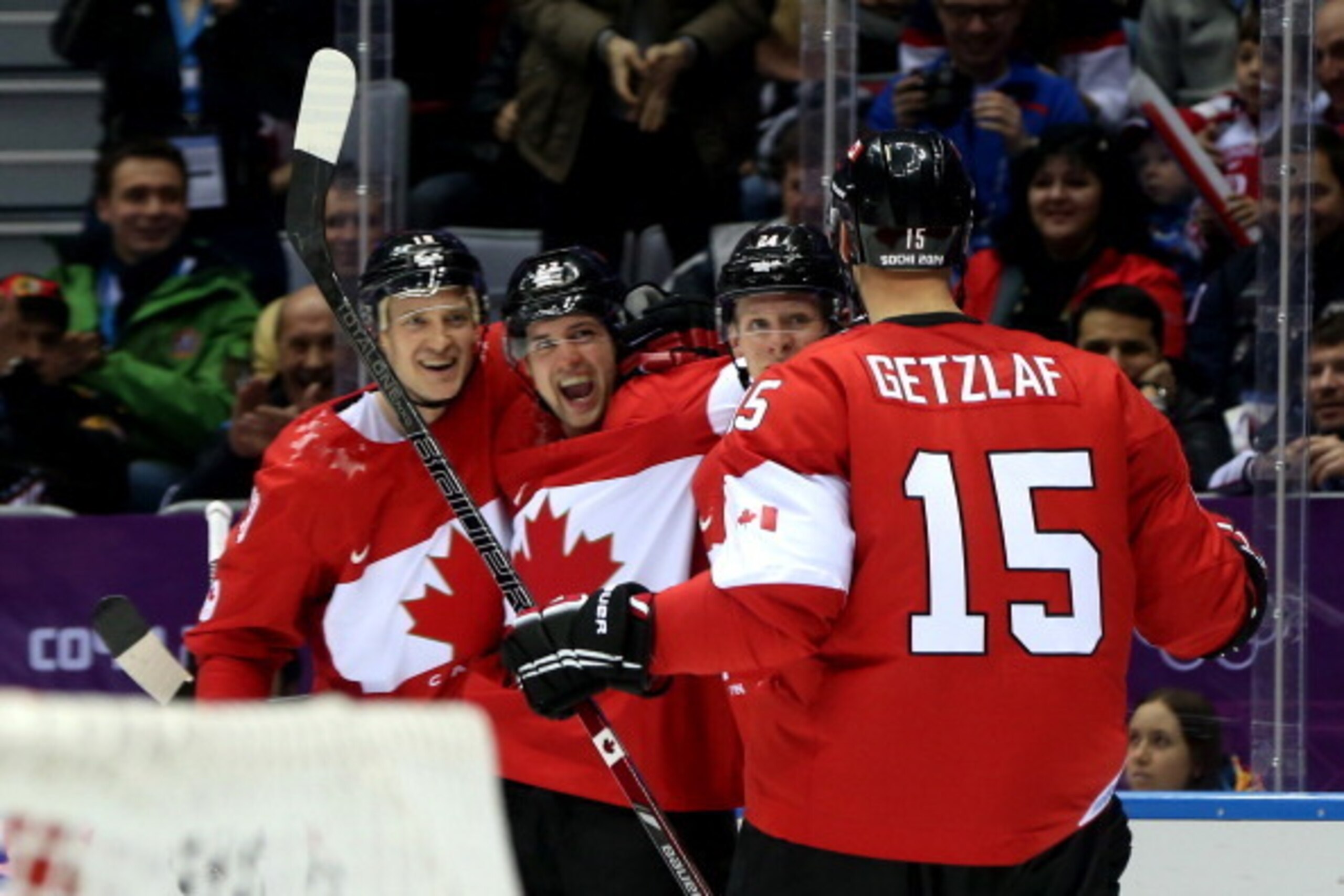 SOCHI, RUSSIA - FEBRUARY 21: Jamie Benn #22 of Canada celebrates scoring a second-period goal against the United States with teammates Jay Bouwmeester #19, Corey Perry #24 and Ryan Getzlaf #15 during the Men's Ice Hockey Semifinal Playoff on Day 14 of th SOCHI, RUSSIA - FEBRUARY 21: Jamie Benn #22 of Canada celebrates scoring a second-period goal against the United States with teammates Jay Bouwmeester #19, Corey Perry #24 and Ryan Getzlaf #15 during the Men's Ice Hockey Semifinal Playoff on Day 14 of th