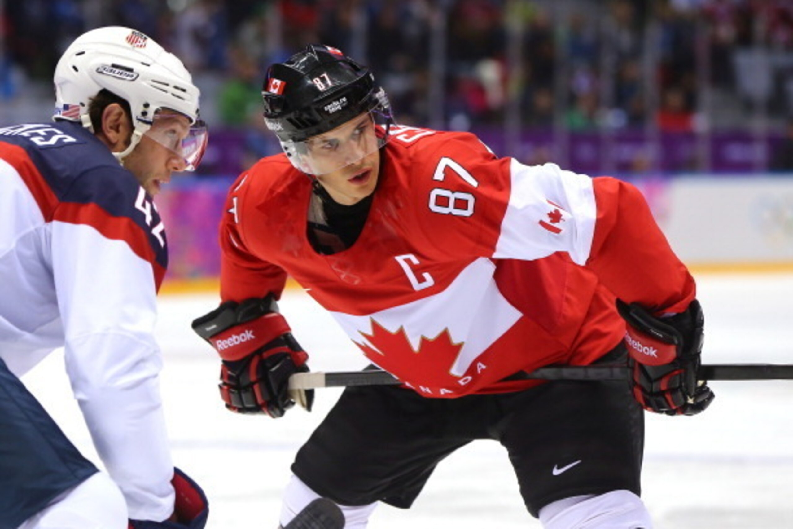 SOCHI, RUSSIA - FEBRUARY 21:  Sidney Crosby #87 of Canada faces off against David Backes #42 of the United States during the Men's Ice Hockey Semifinal Playoff on Day 14 of the 2014 Sochi Winter Olympics at Bolshoy Ice Dome on February 21, 2014 in Sochi, 