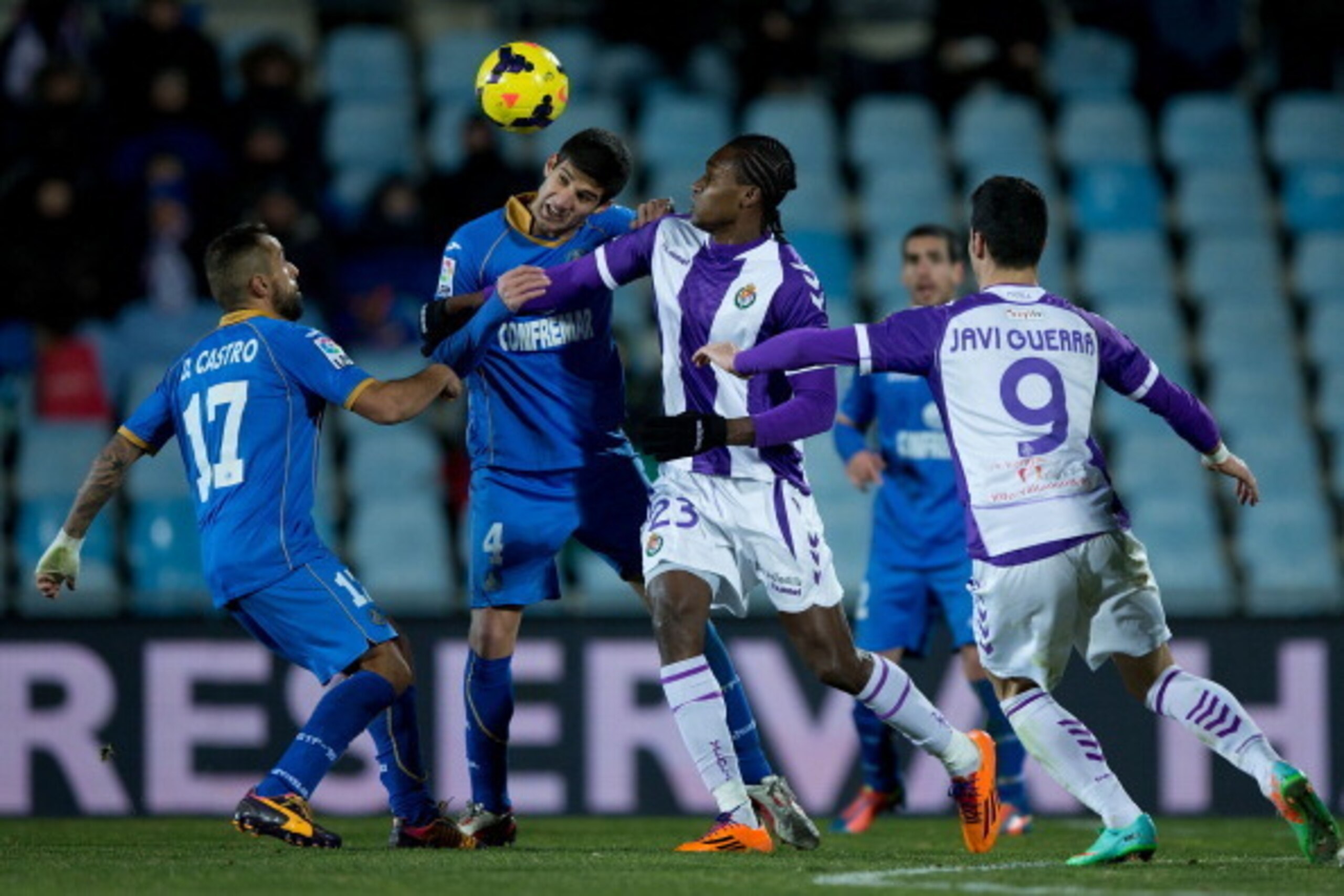 GETAFE, SPAIN - FEBRUARY 01: Lisandro Ezequiel Lopez (2ndL) wins the header before Mateus Contreiras alias Manucho (2ndR) of Real Valladolid CF during the La Liga match between Getafe CF and Real Valladolid CF at Coliseum Alfonso Perez on February 1, 2014 GETAFE, SPAIN - FEBRUARY 01: Lisandro Ezequiel Lopez (2ndL) wins the header before Mateus Contreiras alias Manucho (2ndR) of Real Valladolid CF during the La Liga match between Getafe CF and Real Valladolid CF at Coliseum Alfonso Perez on February 1, 2014