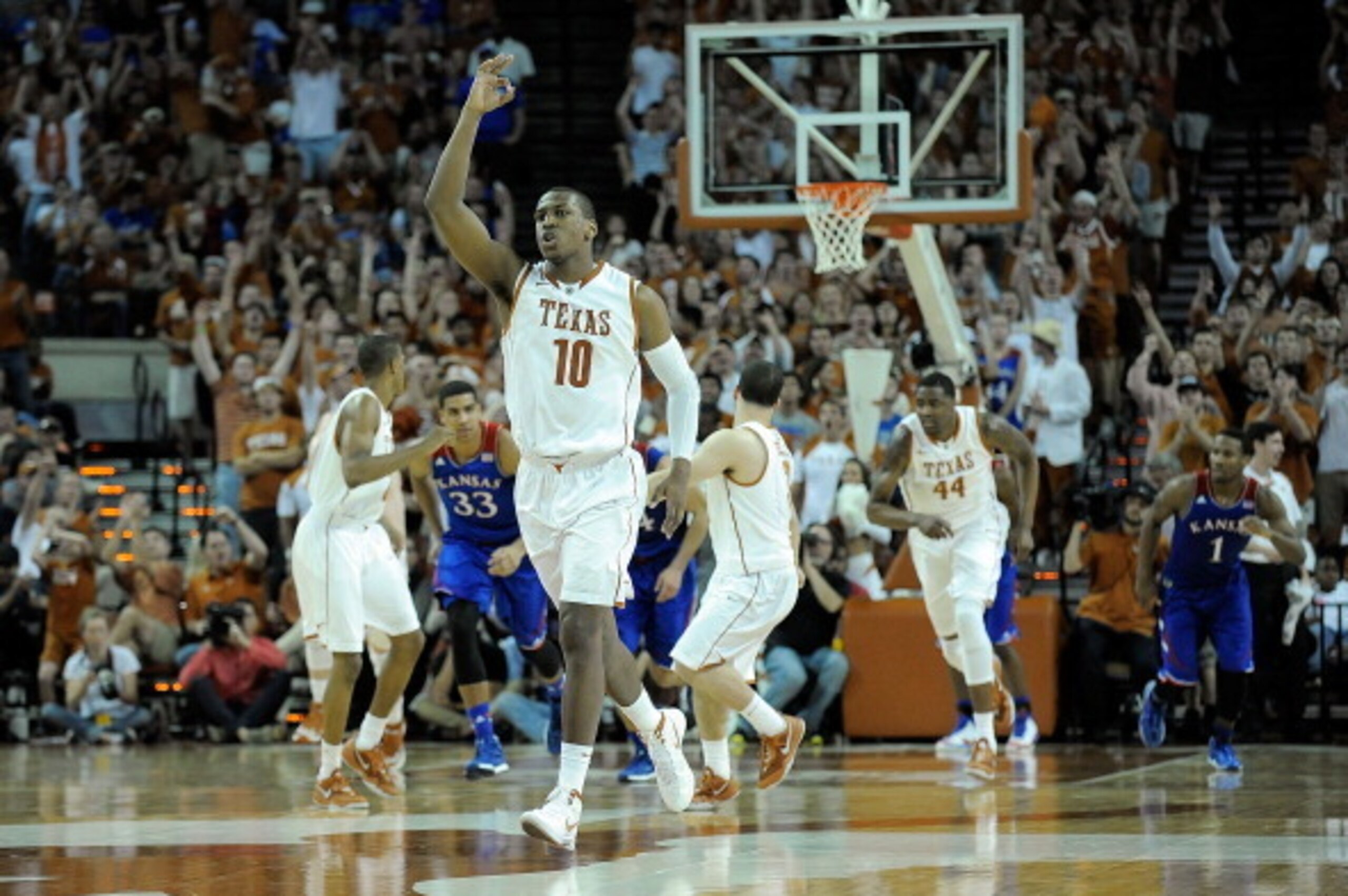 AUSTIN, TX - FEBRUARY 01:  Jonathan Holmes #10 of the Texas Longhorns reacts to a three point shot against the Kansas Jayhawks during a game at The Frank Erwin Center on February 1, 2014 in Austin, Texas.  Texas won the game 81-69.  (Photo by Stacy Revere