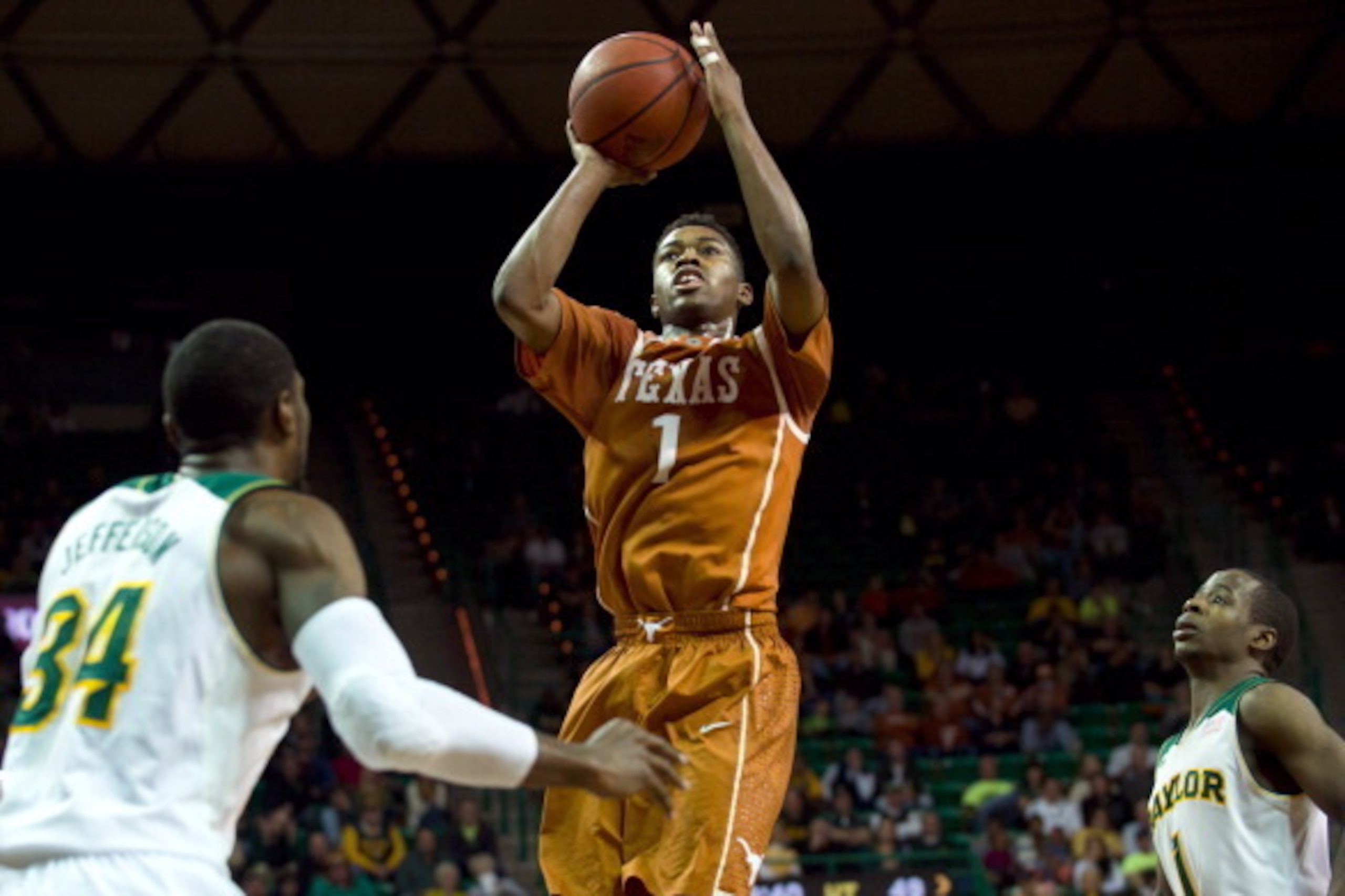 WACO, TX - JANUARY 25: Isaiah Taylor #1 of the Texas Longhorns drives to the basket against the Baylor Bears on January 25, 2014 at the Ferrell Center in Waco, Texas.  (Photo by Cooper Neill/Getty Images)