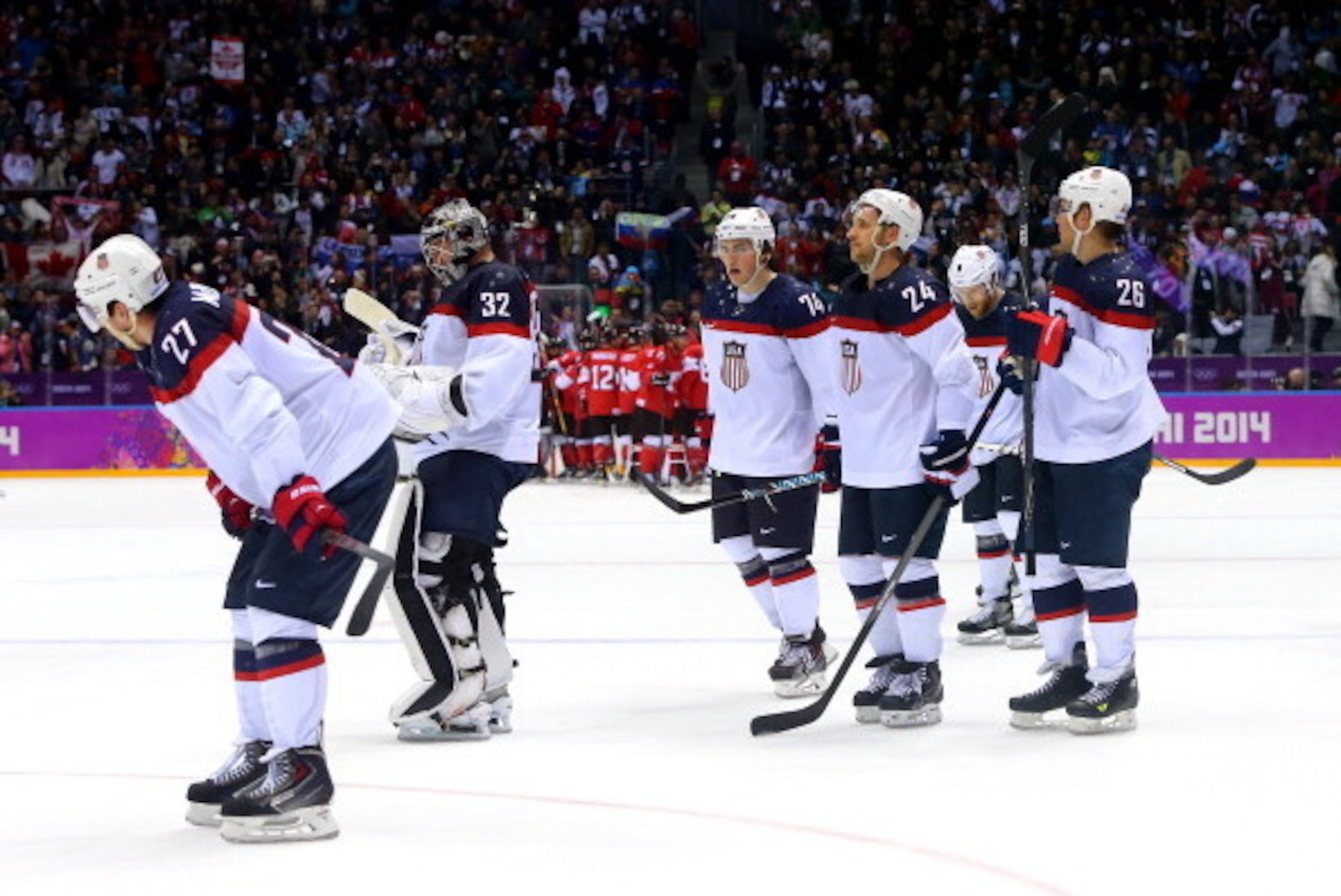 SOCHI, RUSSIA - FEBRUARY 21:  The United States reacts after losing 1-0 to Canada during the Men's Ice Hockey Semifinal Playoff on Day 14 of the 2014 Sochi Winter Olympics at Bolshoy Ice Dome on February 21, 2014 in Sochi, Russia.  (Photo by Martin Rose/G
