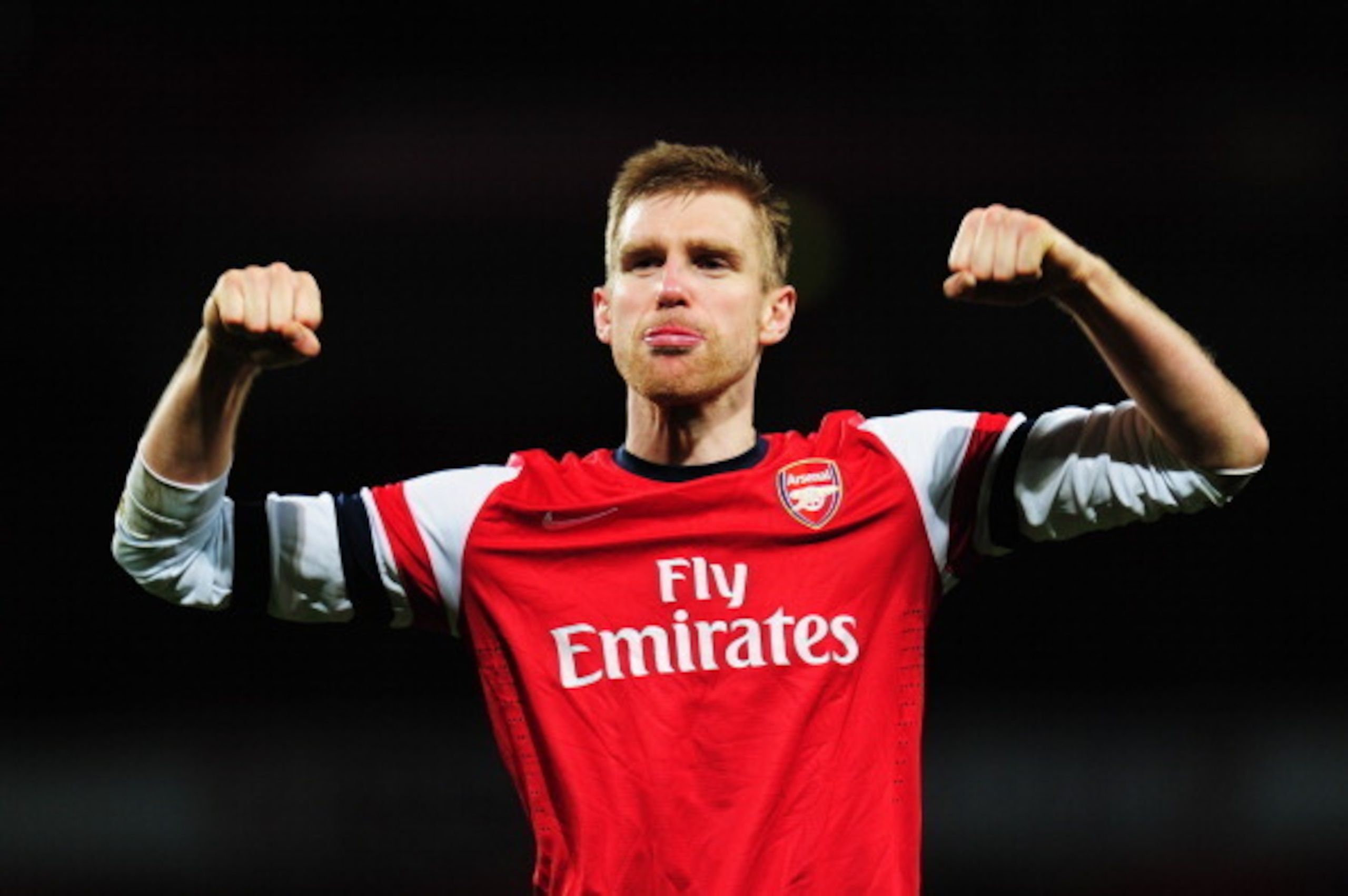 LONDON, ENGLAND - FEBRUARY 16:  Per Mertesacker of Arsenal celebrates at the end of the FA Cup Fifth Round match between Arsenal and Liverpool at the Emirates Stadium on February 16, 2014 in London, England.  (Photo by Shaun Botterill/Getty Images)