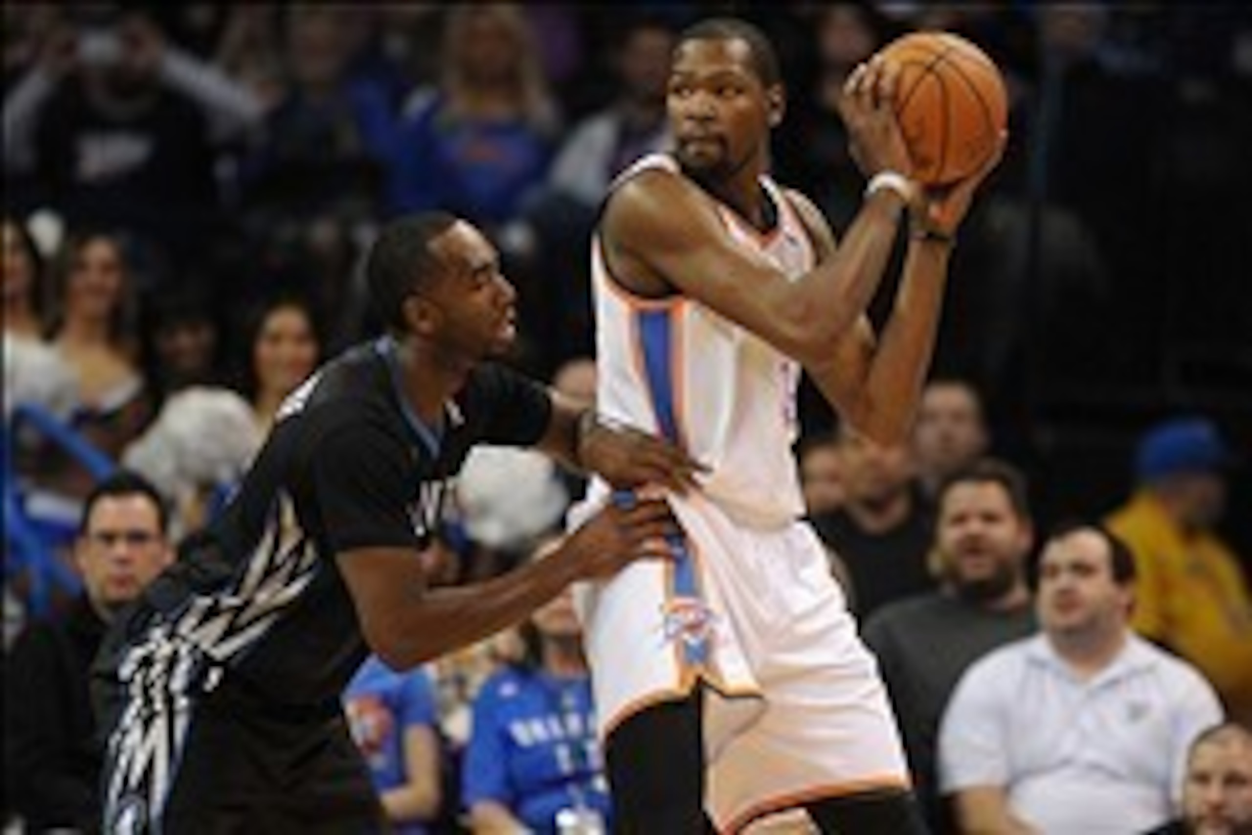 Feb 5, 2014; Oklahoma City, OK, USA; Oklahoma City Thunder small forward Kevin Durant (35) handles the ball against Minnesota Timberwolves power forward Luc Richard Mbah a Moute (12) during the second quarter at Chesapeake Energy Arena. Mandatory Credit: Feb 5, 2014; Oklahoma City, OK, USA; Oklahoma City Thunder small forward Kevin Durant (35) handles the ball against Minnesota Timberwolves power forward Luc Richard Mbah a Moute (12) during the second quarter at Chesapeake Energy Arena. Mandatory Credit:
