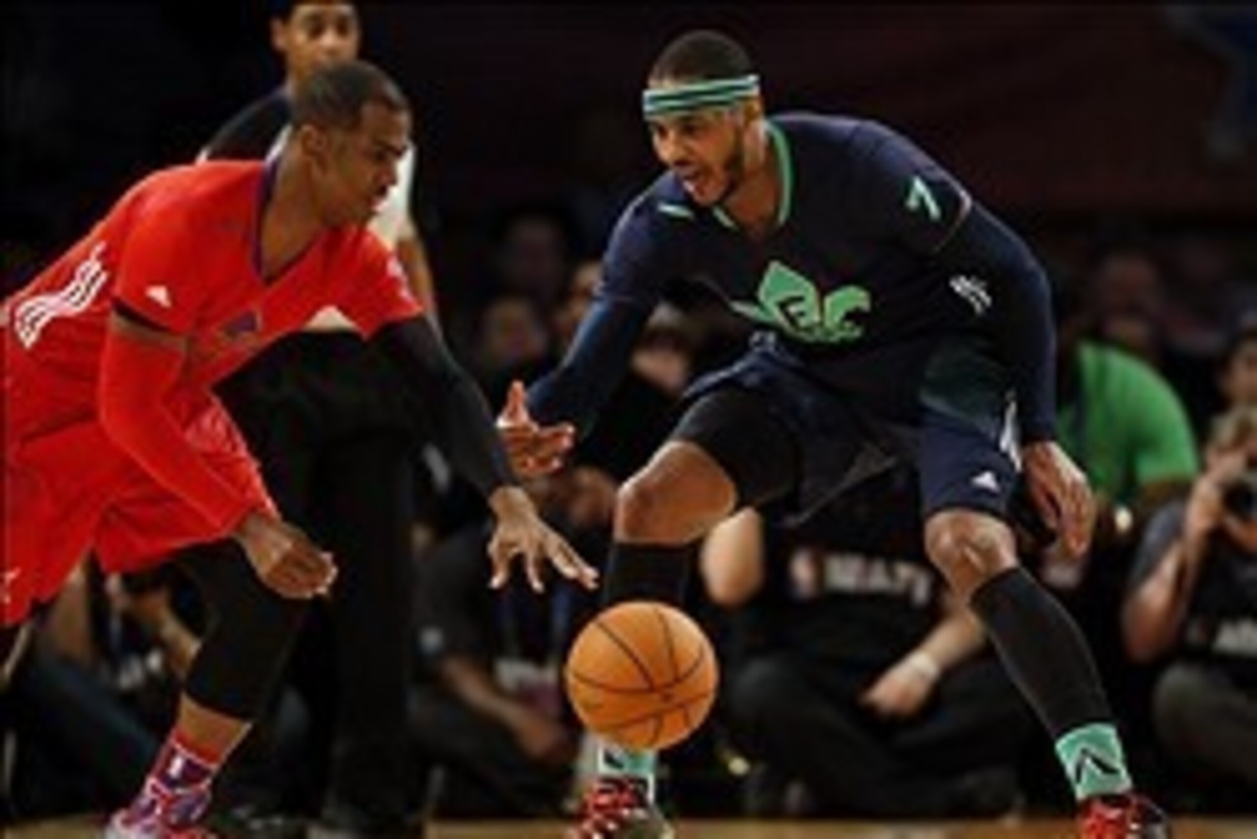 Feb 16, 2014; New Orleans, LA, USA; Eastern Conference forward Carmelo Anthony (7) of the New York Knicks guards Western Conference guard Chris Paul (3) of the Los Angeles Clippers during the 2014 NBA All-Star Game at the Smoothie King Center. Mandatory C Feb 16, 2014; New Orleans, LA, USA; Eastern Conference forward Carmelo Anthony (7) of the New York Knicks guards Western Conference guard Chris Paul (3) of the Los Angeles Clippers during the 2014 NBA All-Star Game at the Smoothie King Center. Mandatory C