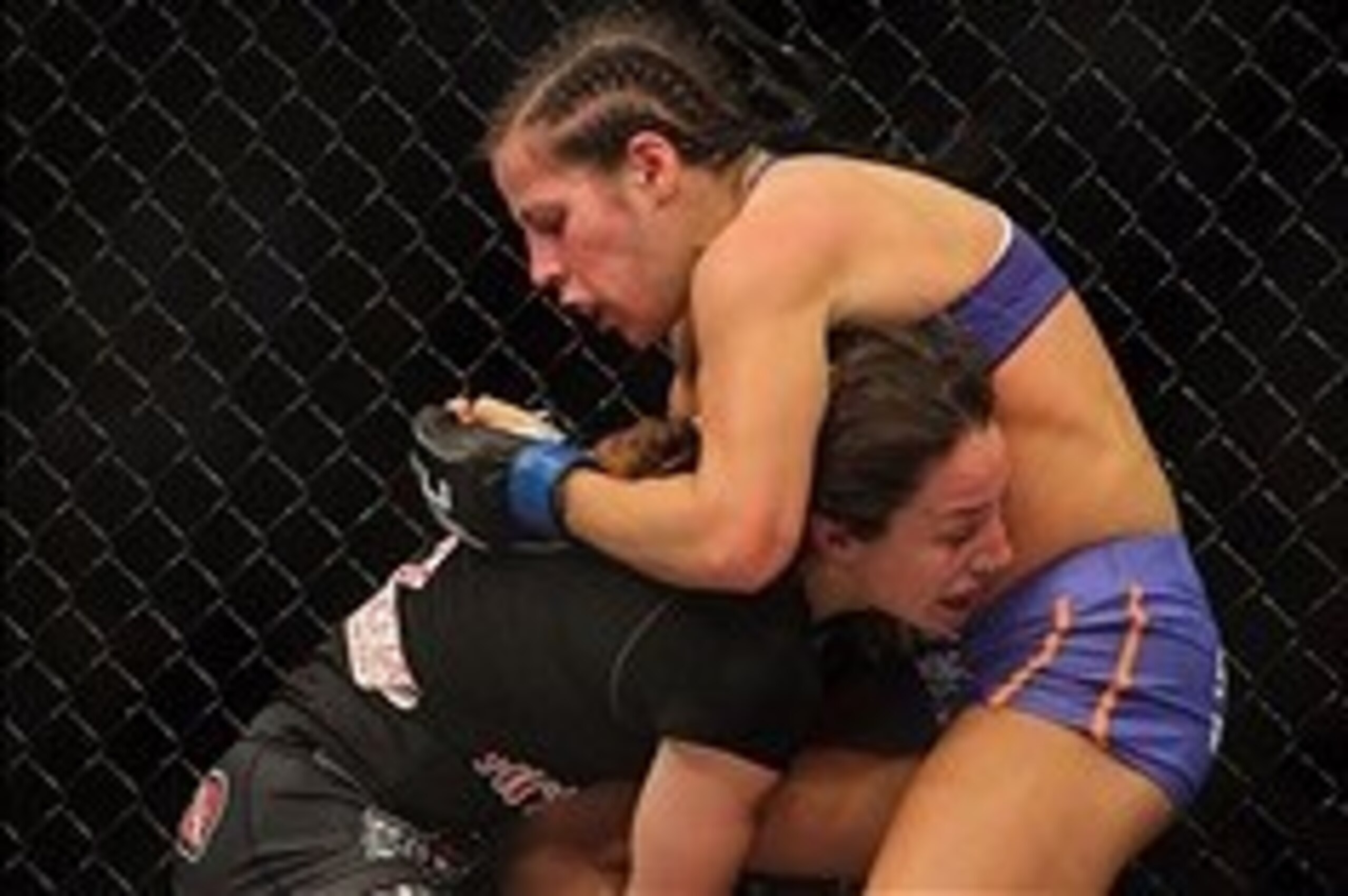 Apr 27, 2013; Newark, NJ, USA; Sara McMann (black shorts) competes against Sheila Gaff (blue shorts) during UFC 159 at the Prudential Center. Mandatory Credit: Brad Penner-USA TODAY Sports