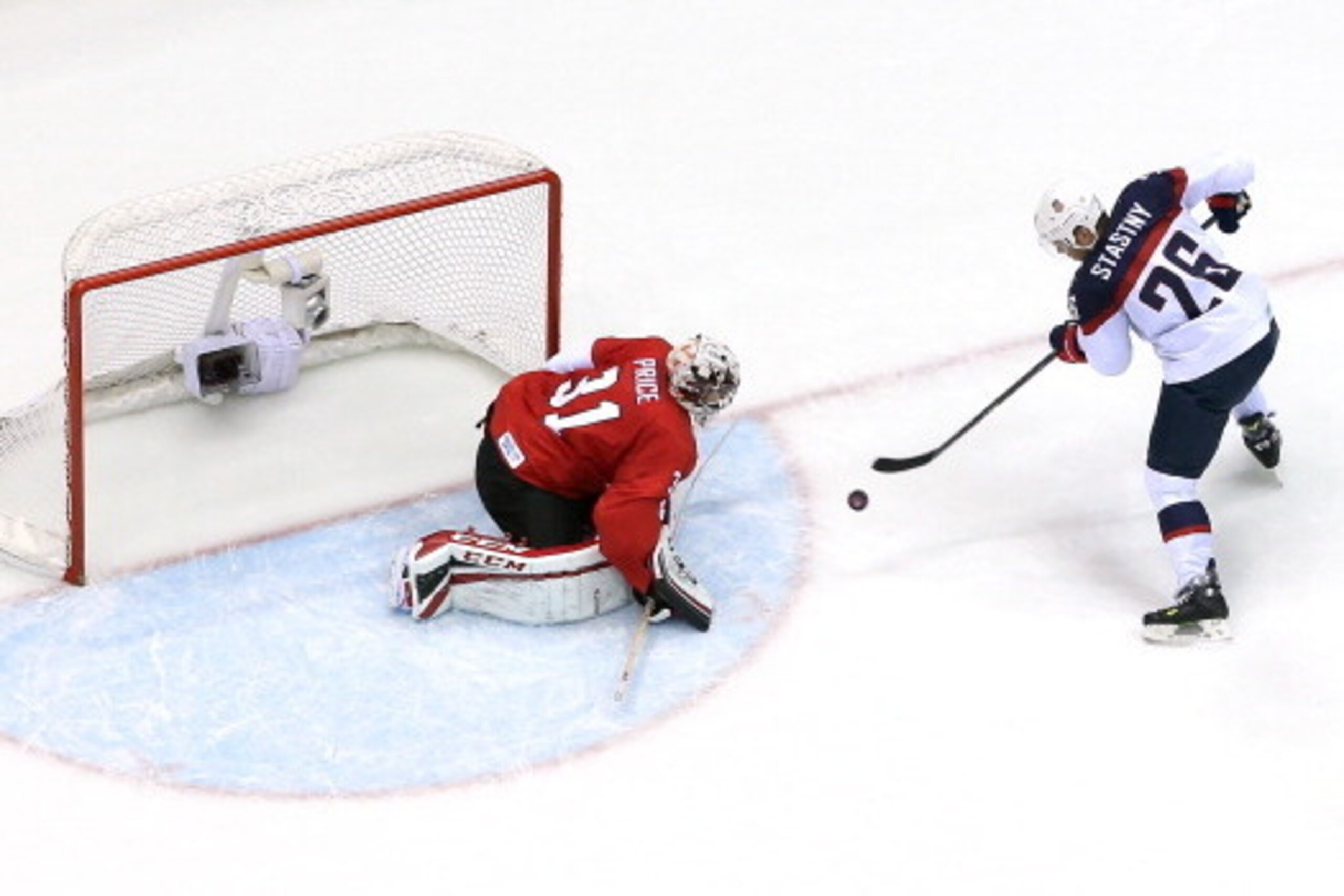 SOCHI, RUSSIA - FEBRUARY 21:  Paul Stastny #26 of the United States attempts a goal against Carey Price #31 of Canada during the Men's Ice Hockey Semifinal Playoff on Day 14 of the 2014 Sochi Winter Olympics at Bolshoy Ice Dome on February 21, 2014 in Soc