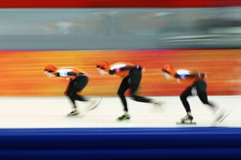 SOCHI, RUSSIA - FEBRUARY 22:  (L to R) Marrit Leenstra, Jorien ter Mors and Ireen Wust of the Netherlands compete during the Women's Team Pursuit Semifinals Speed Skating event on day fifteen of the Sochi 2014 Winter Olympics at  at Adler Arena Skating Ce