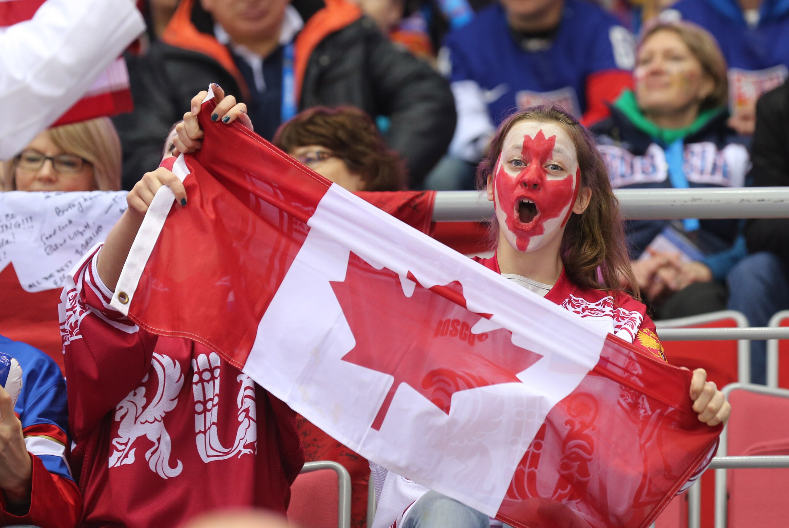 Feb 21, 2014; Sochi, RUSSIA; A Canada fan shows her support prior to the men's ice hockey semifinals between Canada and USA during the Sochi 2014 Olympic Winter Games at Bolshoy Ice Dome. Mandatory Credit: Winslow Townson-USA TODAY Sports