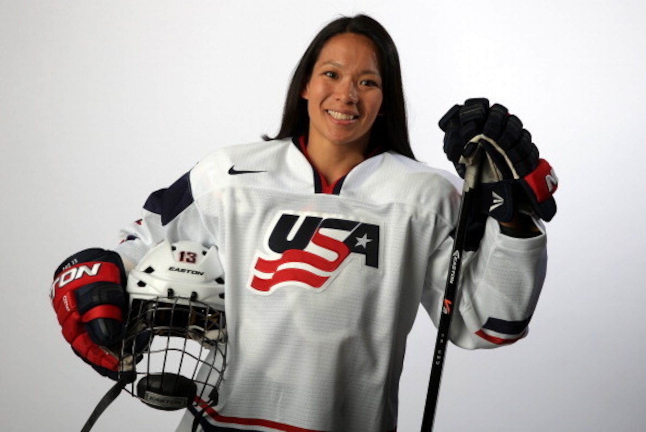 PARK CITY, UT - OCTOBER 02:  Ice Hockey player Julie Chu poses for a portrait during the USOC Media Summit ahead of the Sochi 2014 Winter Olympics on October 2, 2013 in Park City, Utah.  (Photo by Doug Pensinger/Getty Images)