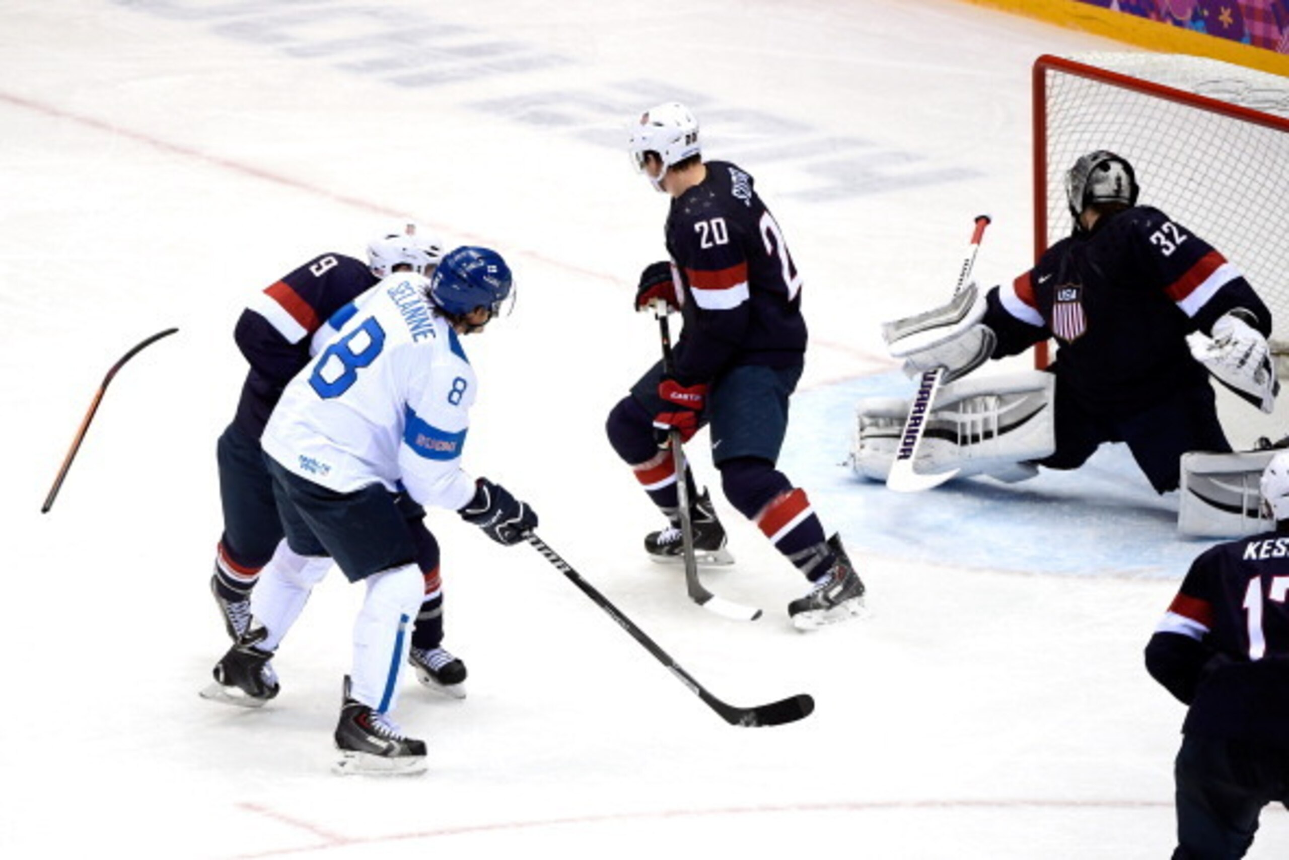 SOCHI, RUSSIA - FEBRUARY 22: Teemu Selanne #8 of Finland shoots and scores against Zach Parise #9, Ryan Suter #20 and Jonathan Quick #32 of the United States in the third period during the Men's Ice Hockey Bronze Medal Game on Day 15 of the 2014 Sochi Win