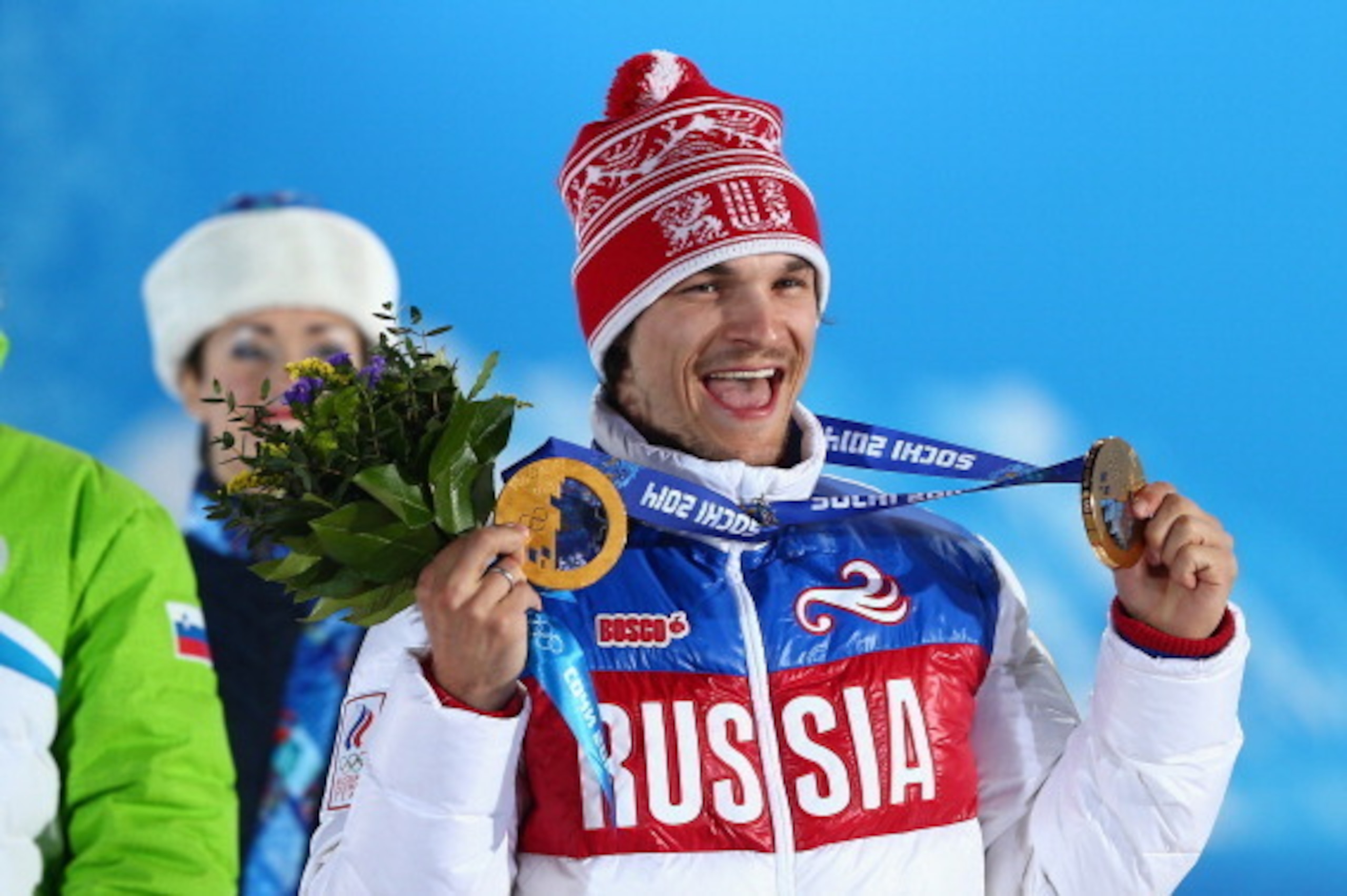 SOCHI, RUSSIA - FEBRUARY 22: Gold medalist Vic Wild of Russia celebrates during the medal ceremony for the Snowboard Men's Parallel Slalom on Day 15 of the Sochi 2014 Winter Olympics at Medals Plaza on February 22, 2014 in Sochi, Russia. (Photo by Clive SOCHI, RUSSIA - FEBRUARY 22: Gold medalist Vic Wild of Russia celebrates during the medal ceremony for the Snowboard Men's Parallel Slalom on Day 15 of the Sochi 2014 Winter Olympics at Medals Plaza on February 22, 2014 in Sochi, Russia. (Photo by Clive