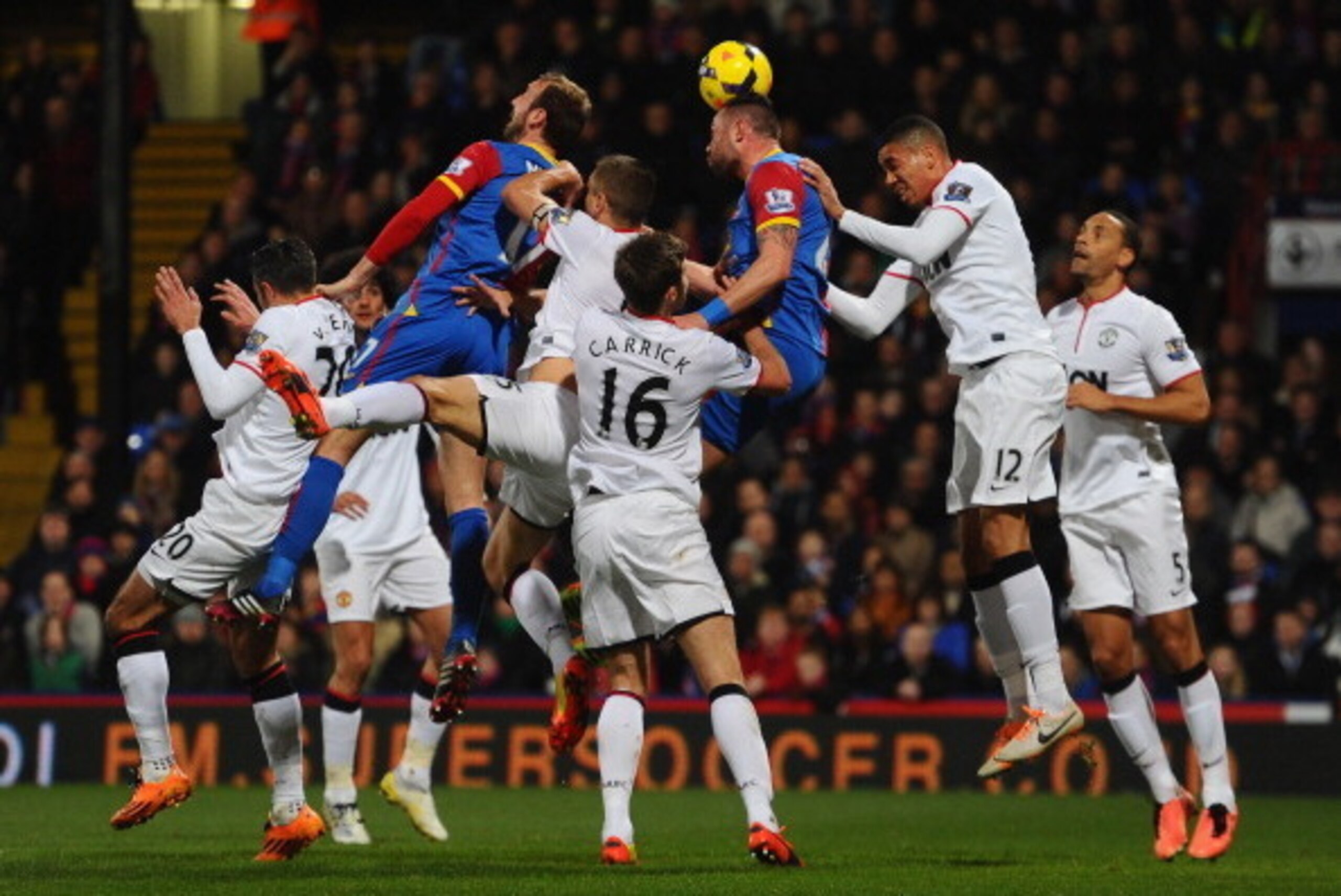 LONDON, ENGLAND - FEBRUARY 22: Joel Ward of Crystal Palace gets above the Manchester United defence to head the ball during the Barclays Premier League match between Crystal Palace and Manchester United at Selhurst Park on February 22, 2014 in London, En LONDON, ENGLAND - FEBRUARY 22: Joel Ward of Crystal Palace gets above the Manchester United defence to head the ball during the Barclays Premier League match between Crystal Palace and Manchester United at Selhurst Park on February 22, 2014 in London, En