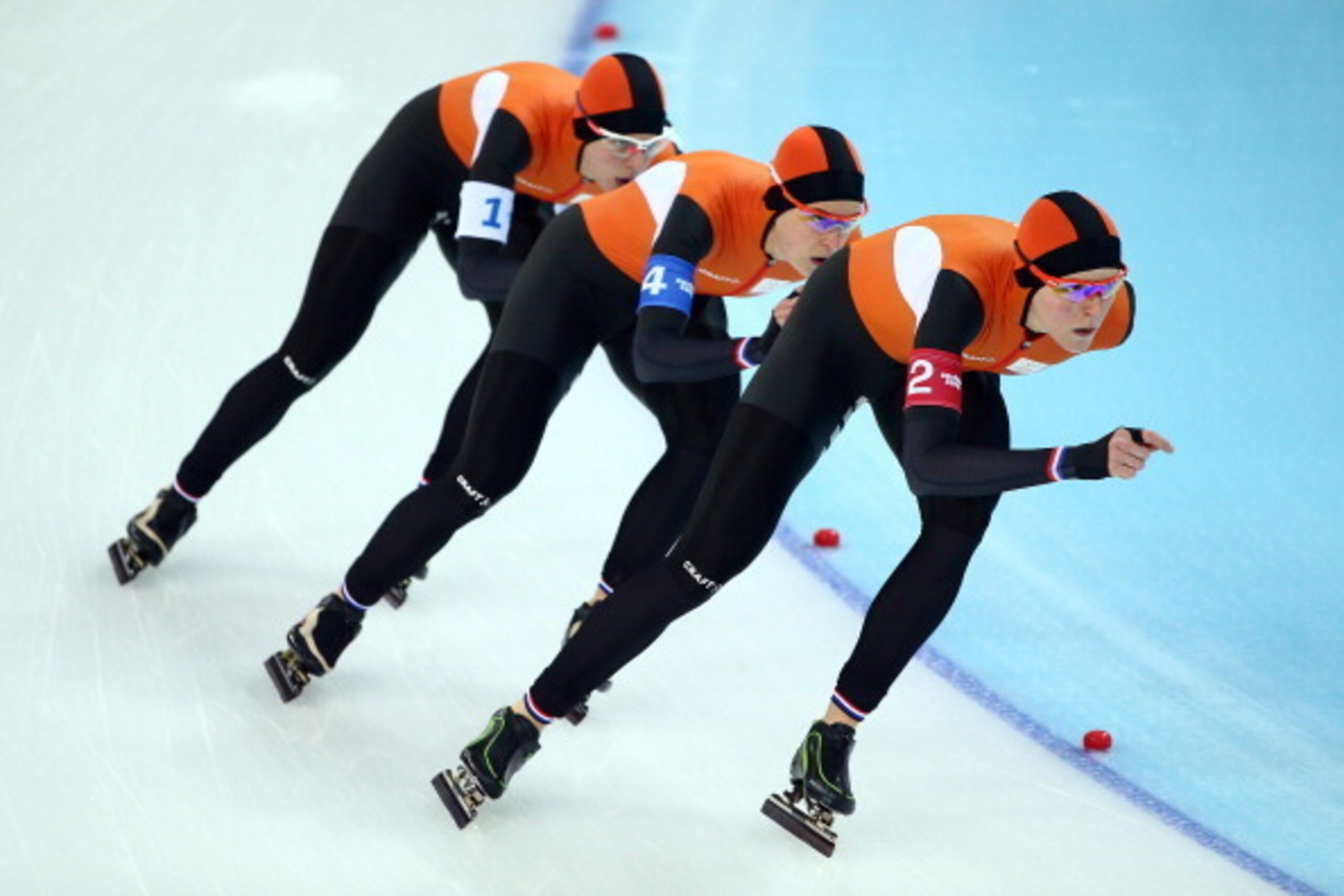 SOCHI, RUSSIA - FEBRUARY 22:  (L to R) Marrit Leenstra, Ireen Wust and Jorien ter Mors of the Netherlands compete during the Women's Team Pursuit Final A Speed Skating event on day fifteen of the Sochi 2014 Winter Olympics at  at Adler Arena Skating Cente