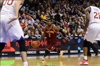 Feb 18, 2014; Philadelphia, PA, USA; Cleveland Cavaliers guard Kyrie Irving (2) during the third quarter against the Philadelphia 76ers at the Wells Fargo Center. The Cavaliers defeated the Sixers 114-85. Mandatory Credit: Howard Smith-USA TODAY Sports