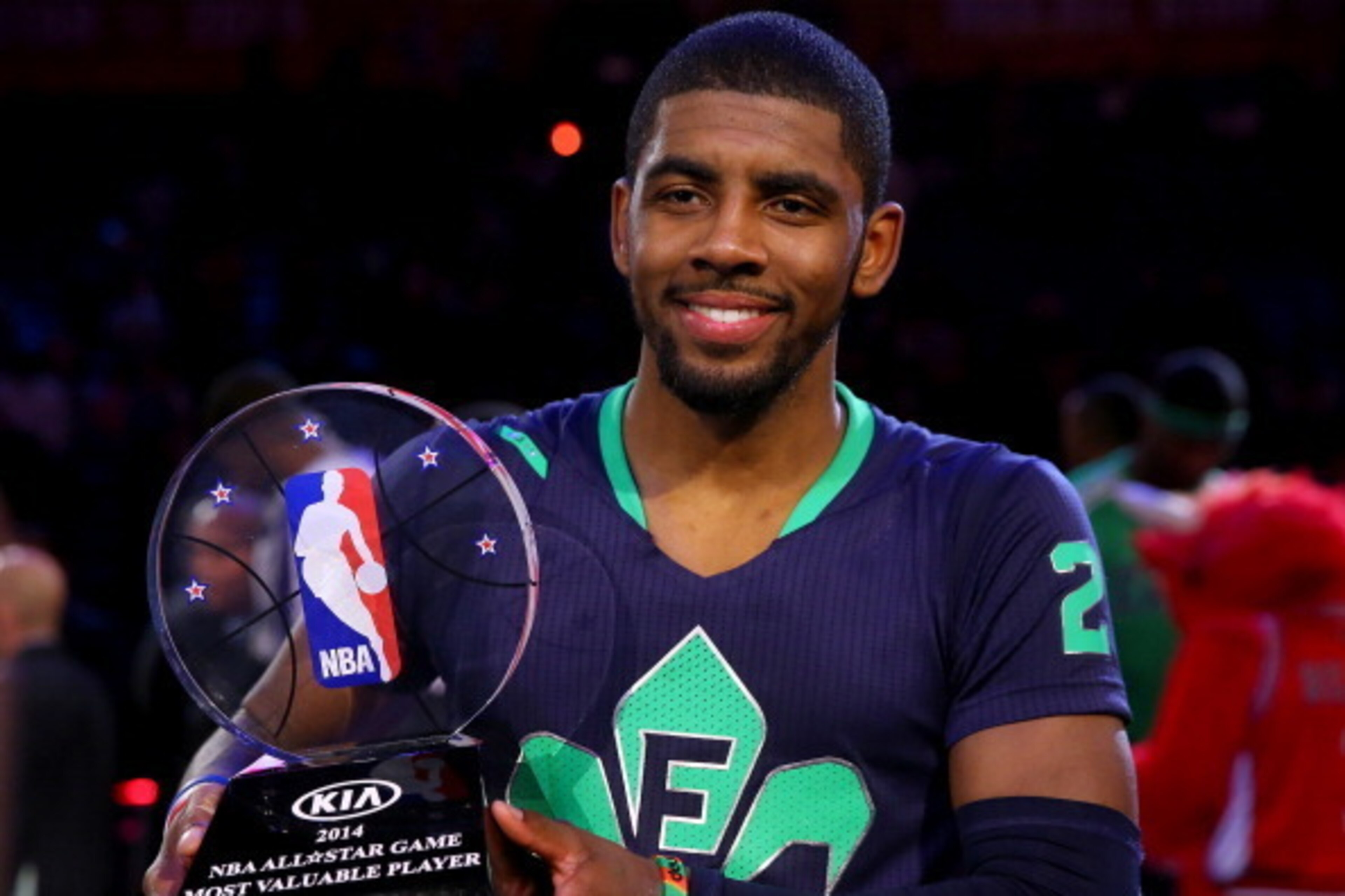 NEW ORLEANS, LA - FEBRUARY 16:  The Eastern Conference's Kyrie Irving #2 of the Cleveland Cavaliers celebrates with the Kia NBA All-Star Game MVP trophy after the 2014 NBA All-Star game at the Smoothie King Center on February 16, 2014 in New Orleans, Loui