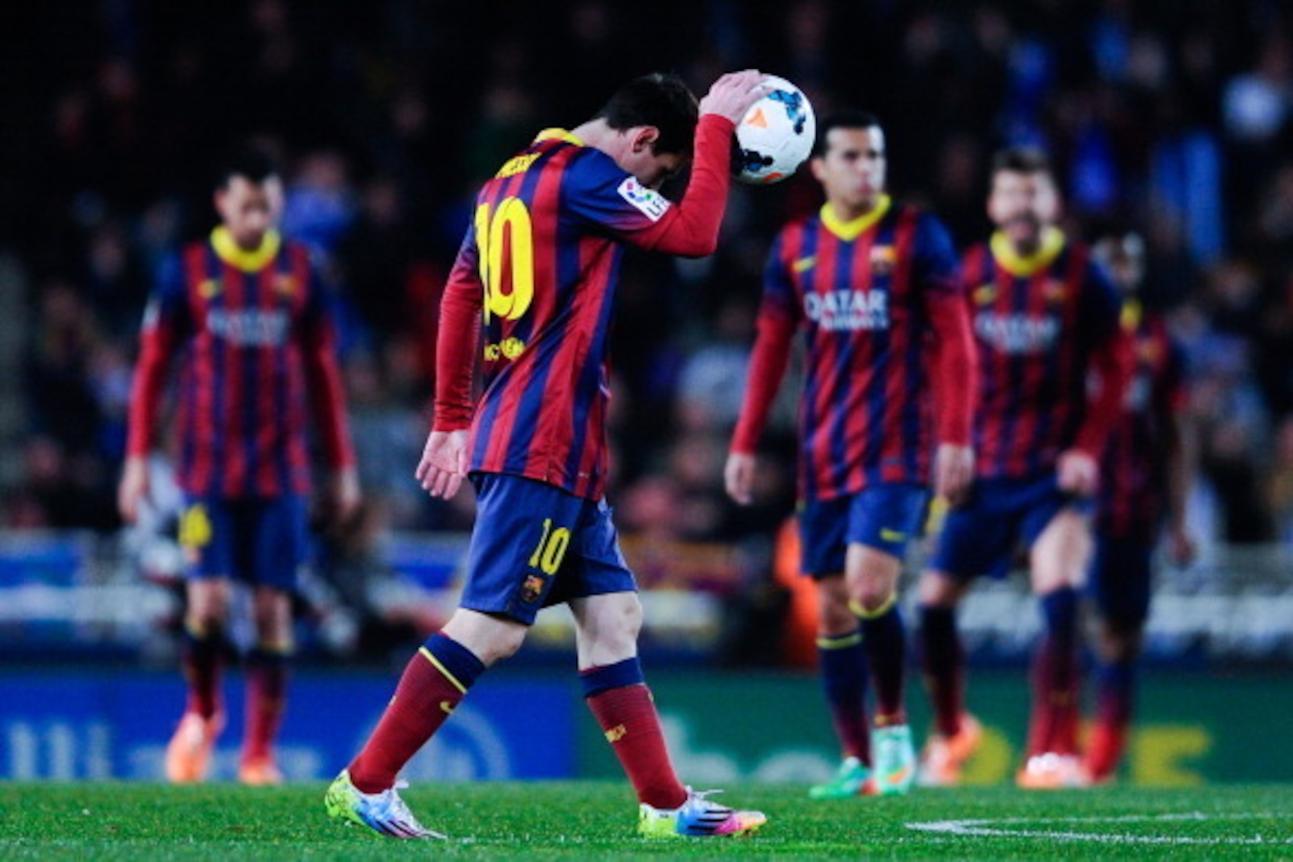 SAN SEBASTIAN, SPAIN - FEBRUARY 22:  Lionel Messi of FC Barcelona reacts after Gorka Elustondo Urkola of Real Sociedad scored the opening goal during the La Liga match between Real Sociedad and FC Barcelona at Estadio Anoeta on February 22, 2014 in San Se