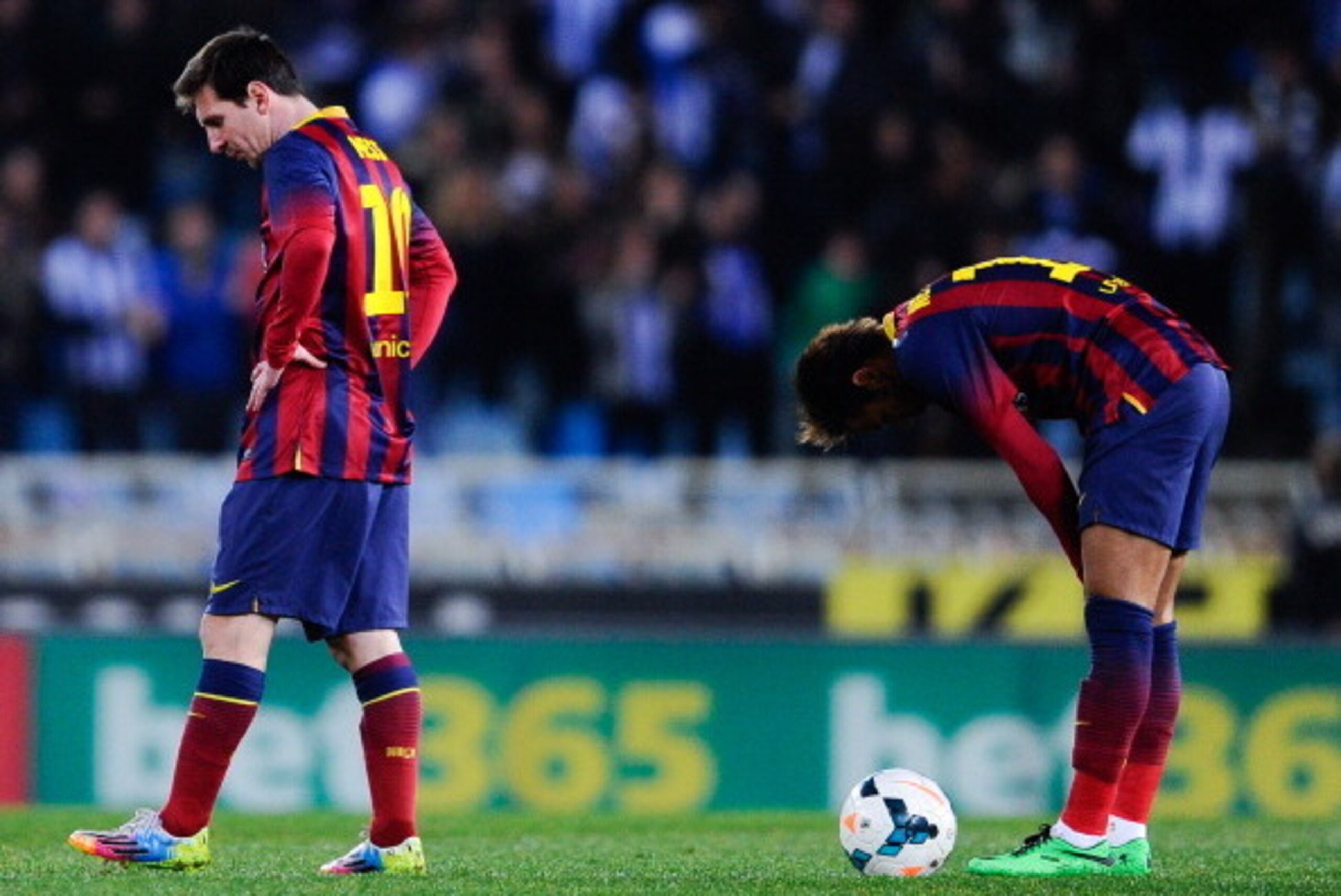 SAN SEBASTIAN, SPAIN - FEBRUARY 22: Lionel Messi (L) and Neymar of FC Barcelona react after Antoine Griezmann of Real Sociedad scored his team's second goal goal during the La Liga match between Real Sociedad and FC Barcelona at Estadio Anoeta on Februar SAN SEBASTIAN, SPAIN - FEBRUARY 22: Lionel Messi (L) and Neymar of FC Barcelona react after Antoine Griezmann of Real Sociedad scored his team's second goal goal during the La Liga match between Real Sociedad and FC Barcelona at Estadio Anoeta on Februar