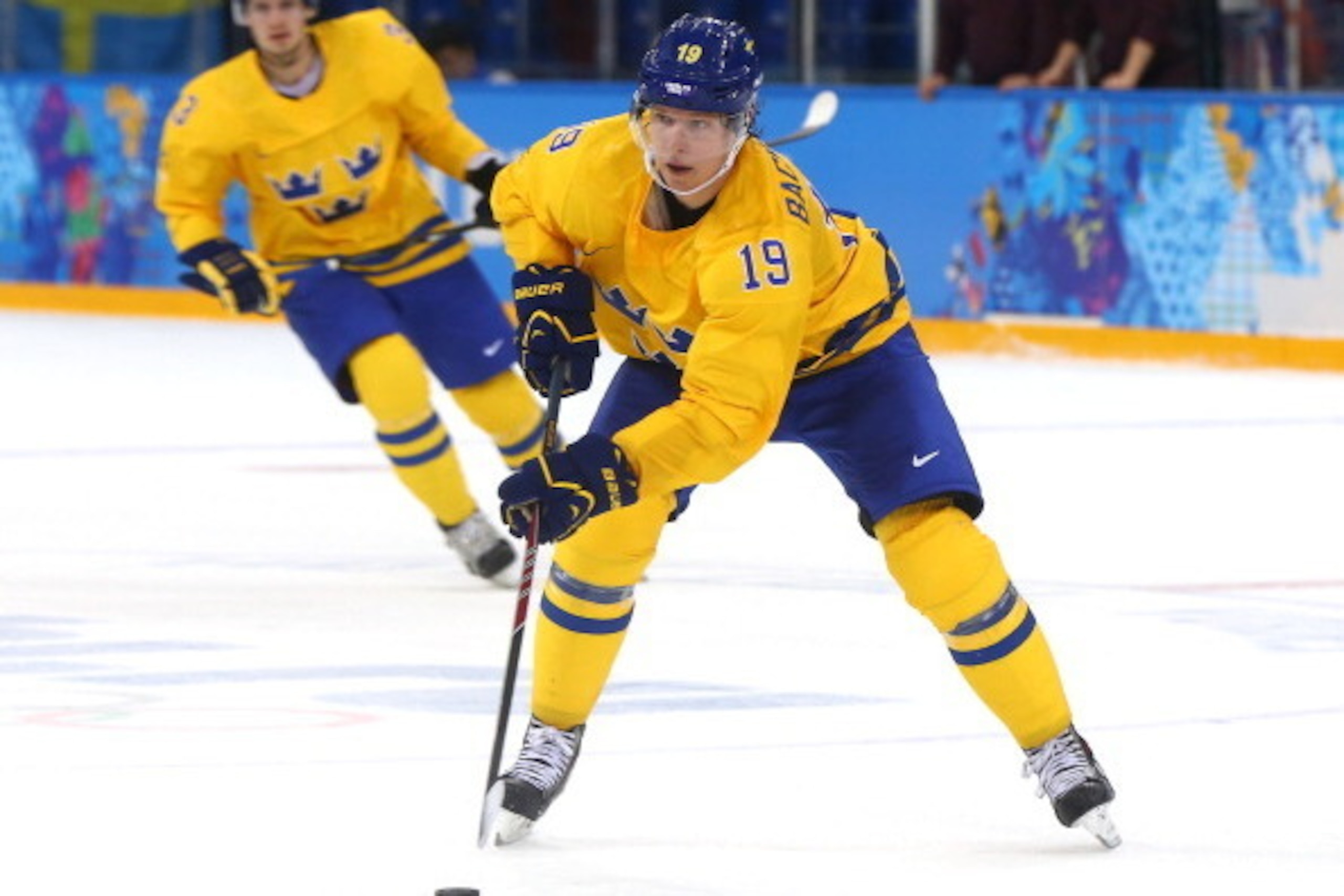 SOCHI, RUSSIA - FEBRUARY 15:  Nicklas Backstrom #19 of Sweden skates against Latvia during the Men's Ice Hockey Preliminary Round Group C game on day eight of the Sochi 2014 Winter Olympics at Shayba Arena on February 15, 2014 in Sochi, Russia.  (Photo by