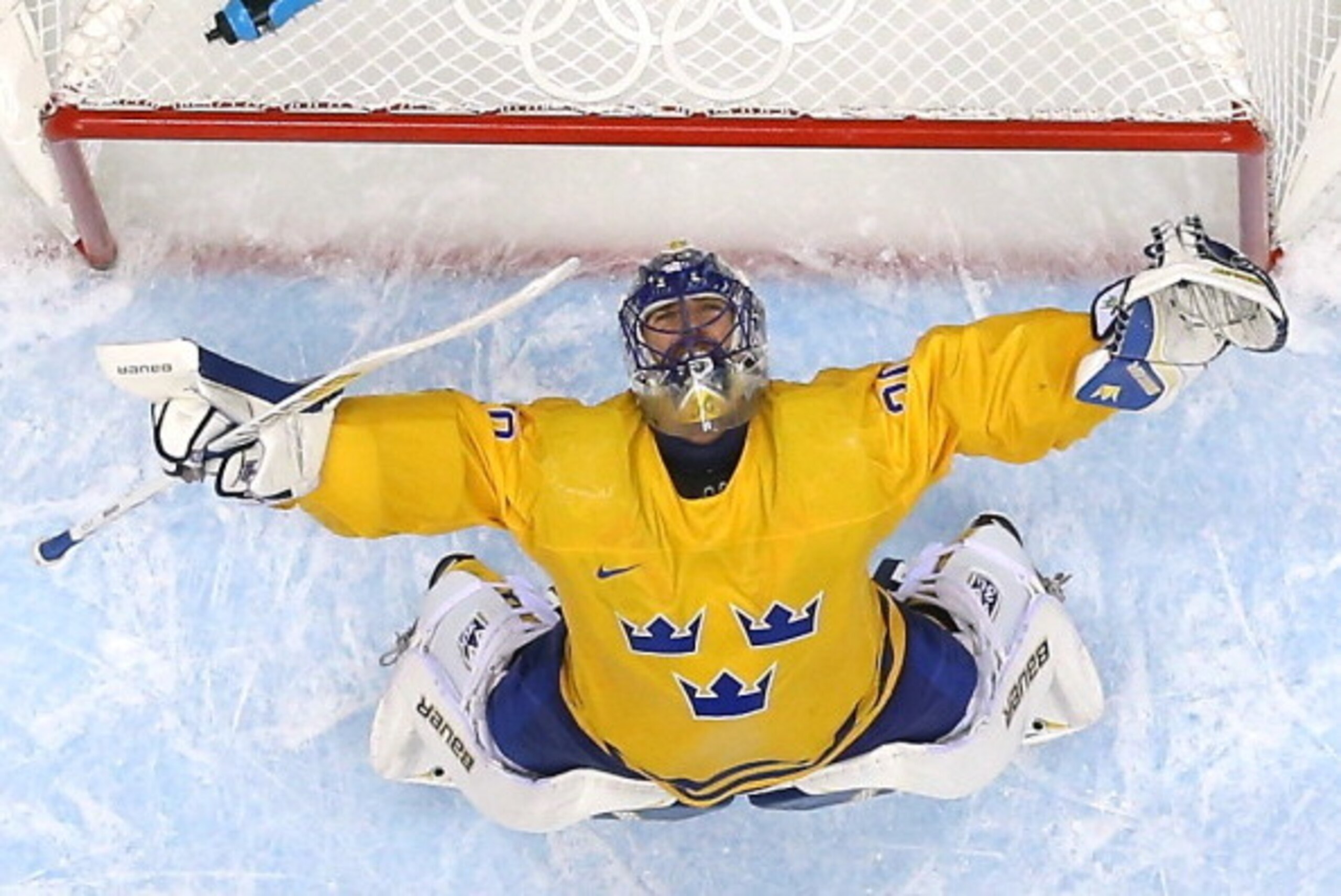 SOCHI, RUSSIA - FEBRUARY 21: Henrik Lundqvist #30 of Sweden celebrates after defeating Finland 2-1 during the Men's Ice Hockey Semifinal Playoff on Day 14 of the 2014 Sochi Winter Olympics at Bolshoy Ice Dome on February 21, 2014 in Sochi, Russia. (Phot SOCHI, RUSSIA - FEBRUARY 21: Henrik Lundqvist #30 of Sweden celebrates after defeating Finland 2-1 during the Men's Ice Hockey Semifinal Playoff on Day 14 of the 2014 Sochi Winter Olympics at Bolshoy Ice Dome on February 21, 2014 in Sochi, Russia. (Phot