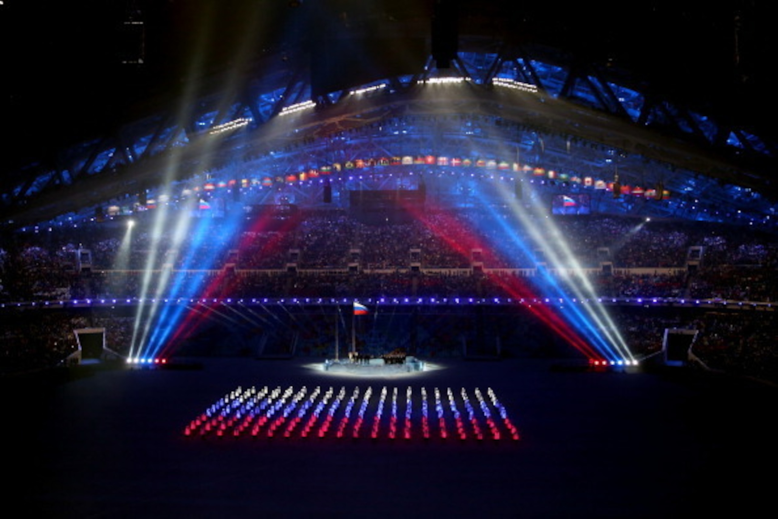 SOCHI, RUSSIA - FEBRUARY 07:  A Russian flag is formed with lights during the Opening Ceremony of the Sochi 2014 Winter Olympics at Fisht Olympic Stadium on February 7, 2014 in Sochi, Russia.  (Photo by Bruce Bennett/Getty Images)